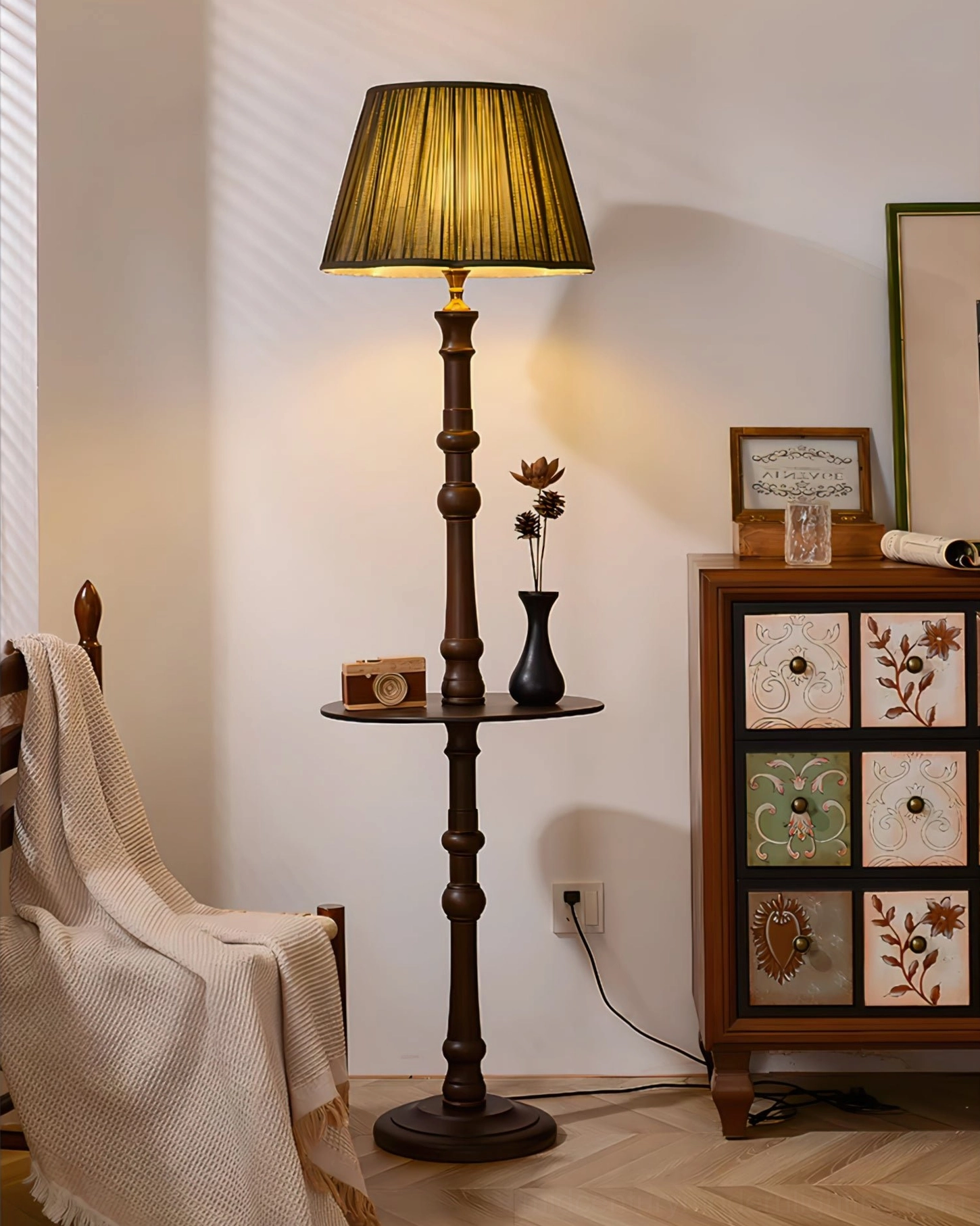 Moonshine Floor Lamp with warm lighting and small decorative accents in vintage home setting