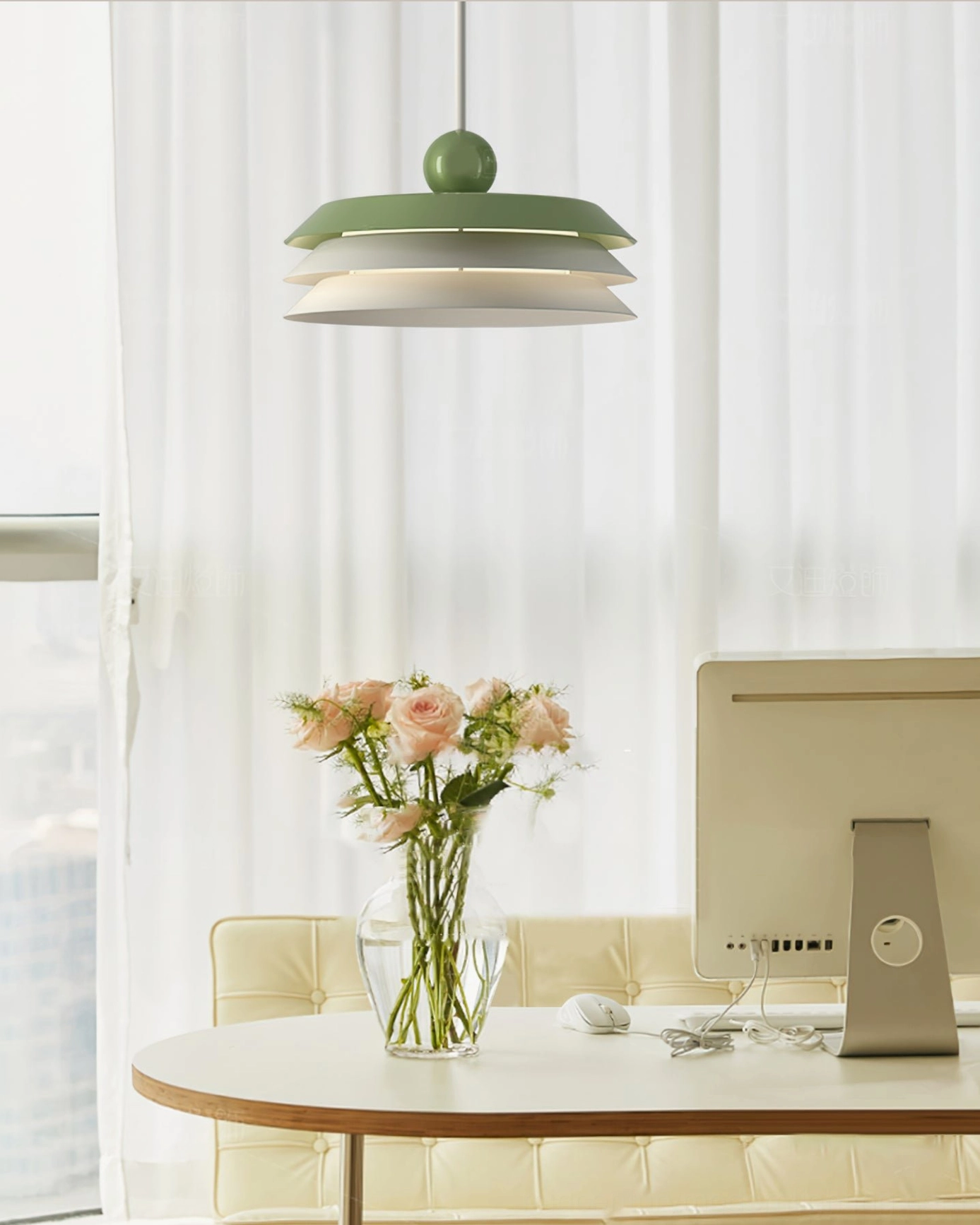 Morandi style pendant lamp suspended in cozy home office workspace with warm neutral tones