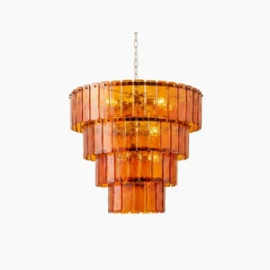 Moreland tiered glass chandelier with warm amber hand-cast glass panels in frontal studio view