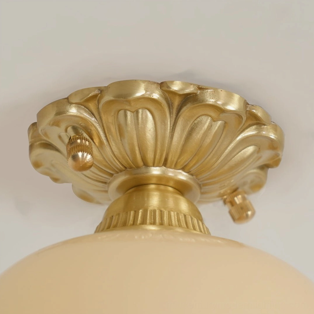 Morup ceiling lamp architectural detail highlighting sculptural petal form and polished brass hardware