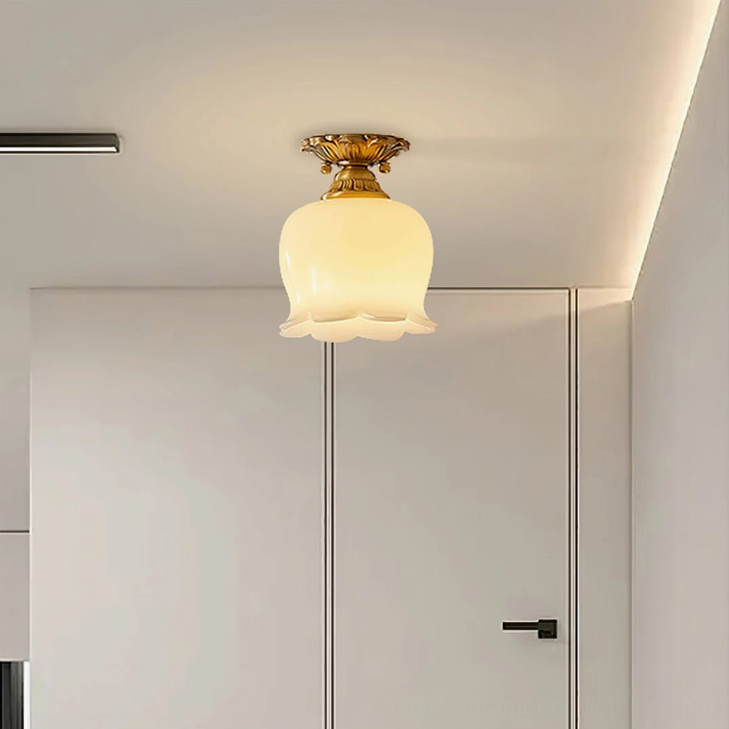 Morup tulip ceiling light detail shot showing brass canopy and scalloped resin petal edge design