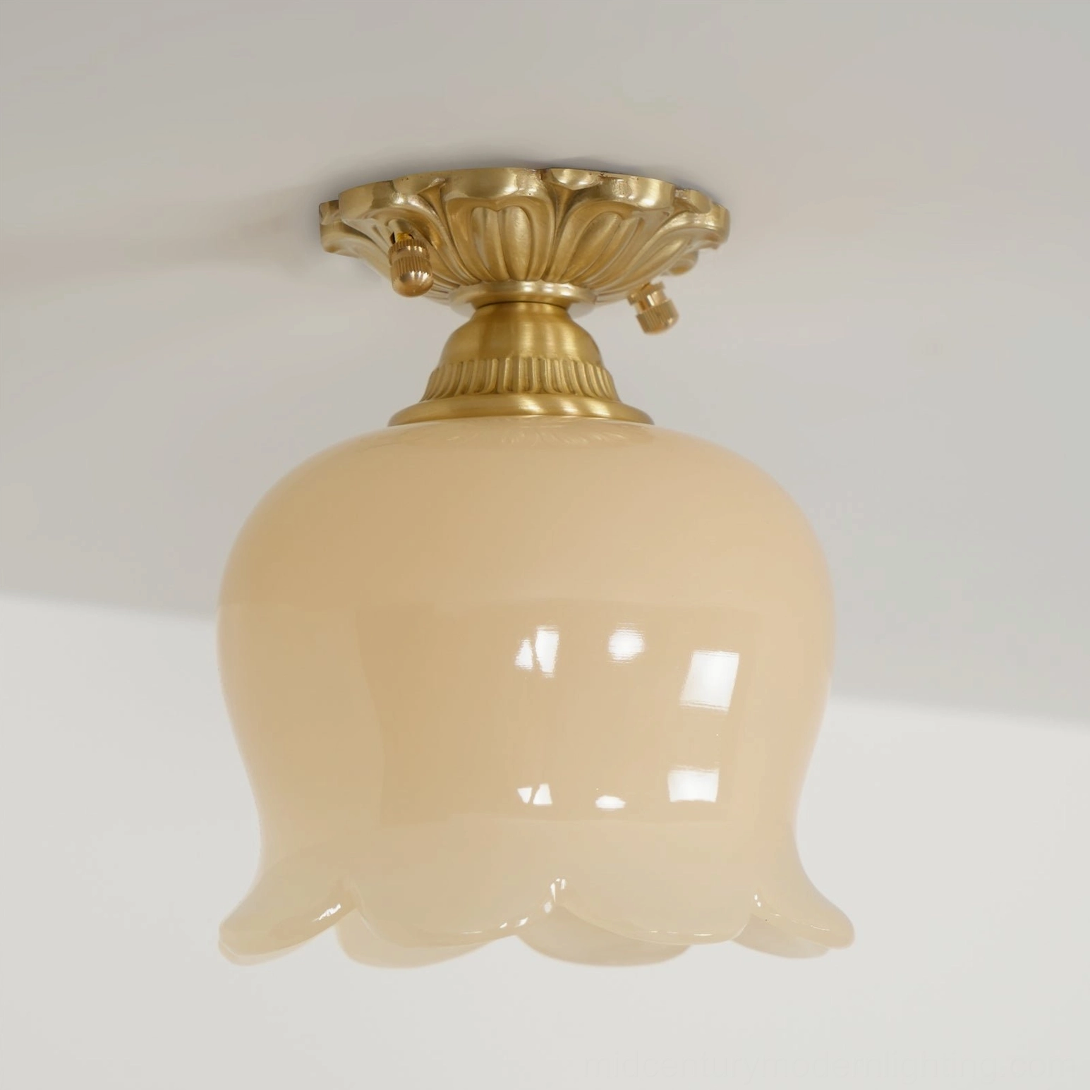 Morup mid-century modern ceiling fixture showing brass and beige resin composition and compact scale