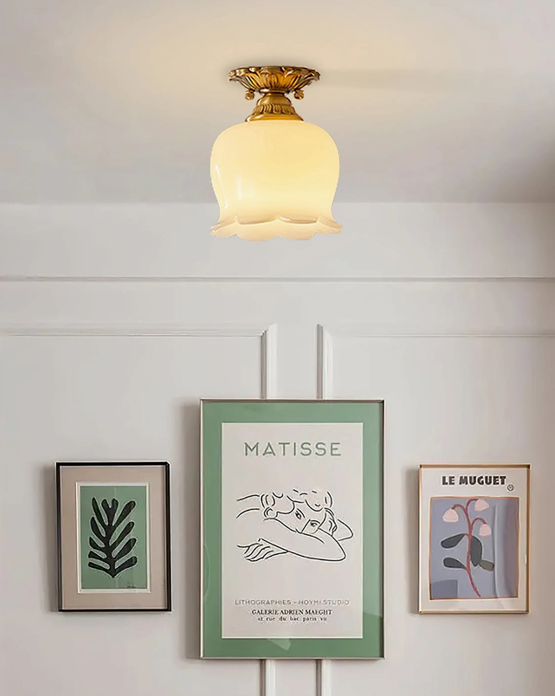 Morup tulip ceiling lamp near minimalist wall art, brass and milk glass vintage French accent lighting