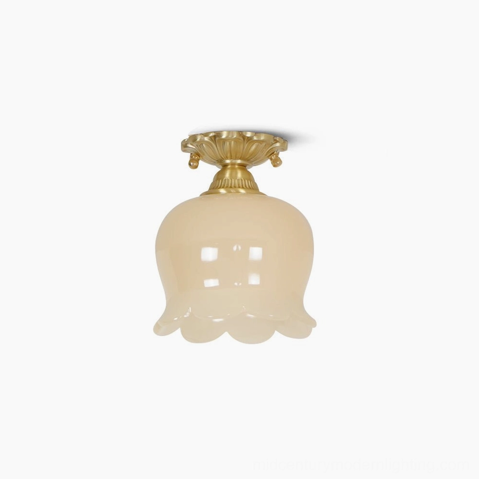 Morup tulip flush mount ceiling lamp with polished brass canopy and beige resin sculptural petal shade, overhead product view
