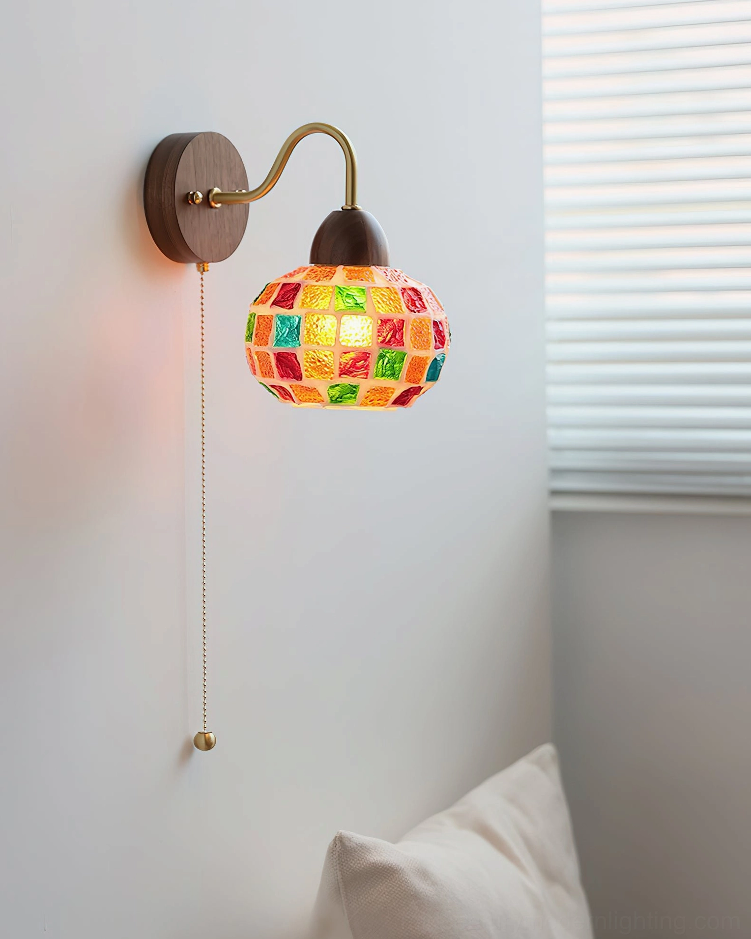 Compact mosaic glass wall lamp fixture showing walnut wood base and colorful tile assembly detail
