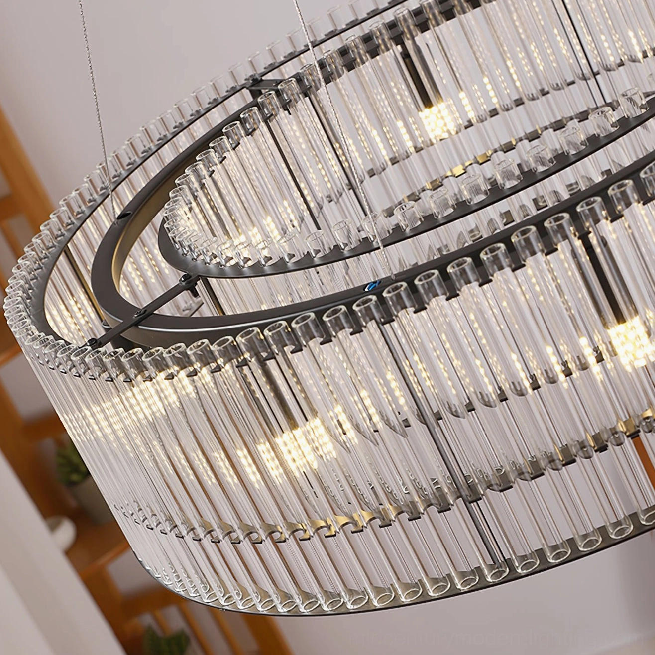 Mossi glass chandelier close-up detail shot dual-layer ring structure shiny black metal clear glass rods precision engineering
