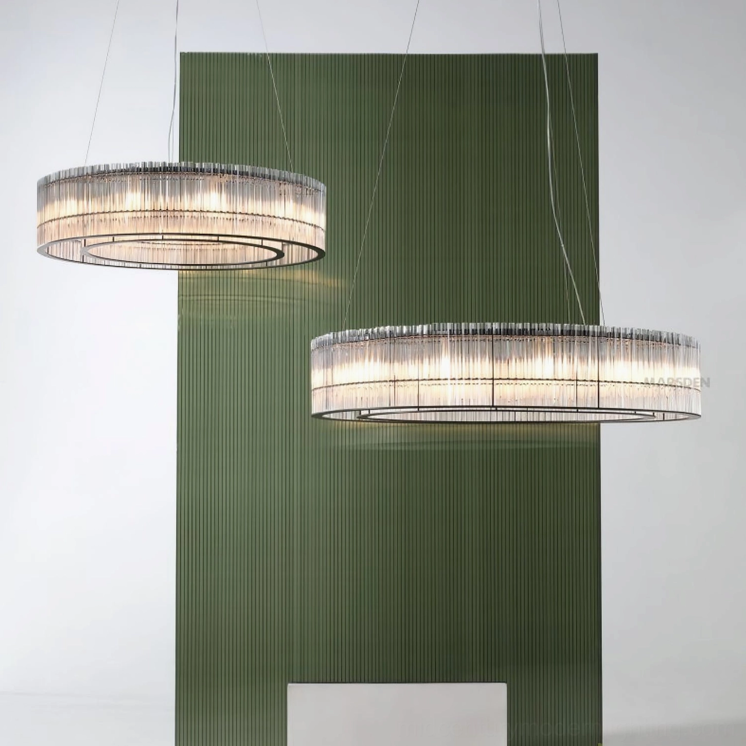 Dual Mossi glass chandeliers eye-level perspective modern dining room with green accent wall matte black and clear glass contemporary design