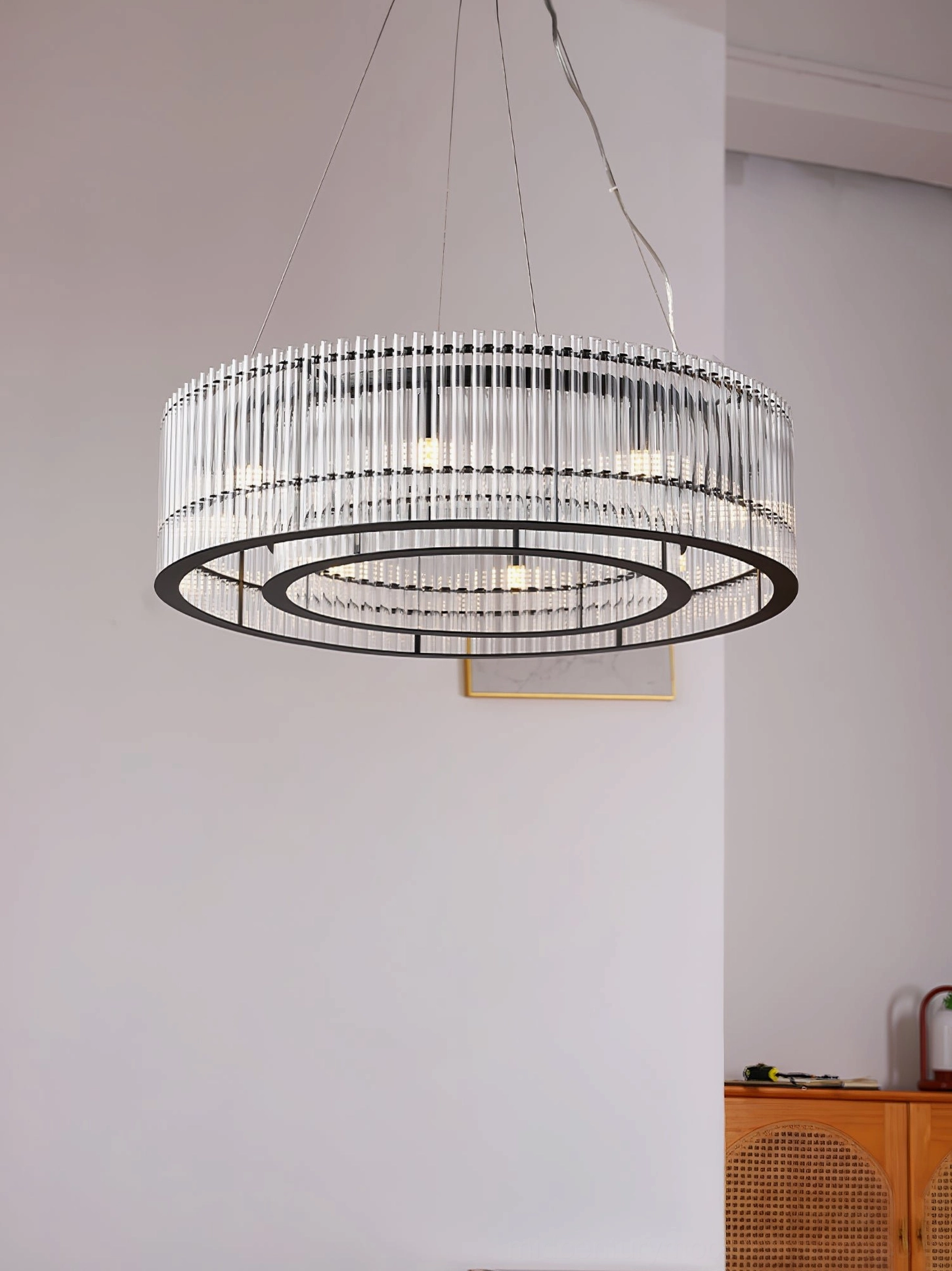 Mossi modern glass pendant chandelier studio angle shot black metal frame clear glass tubes mid-century contemporary design
