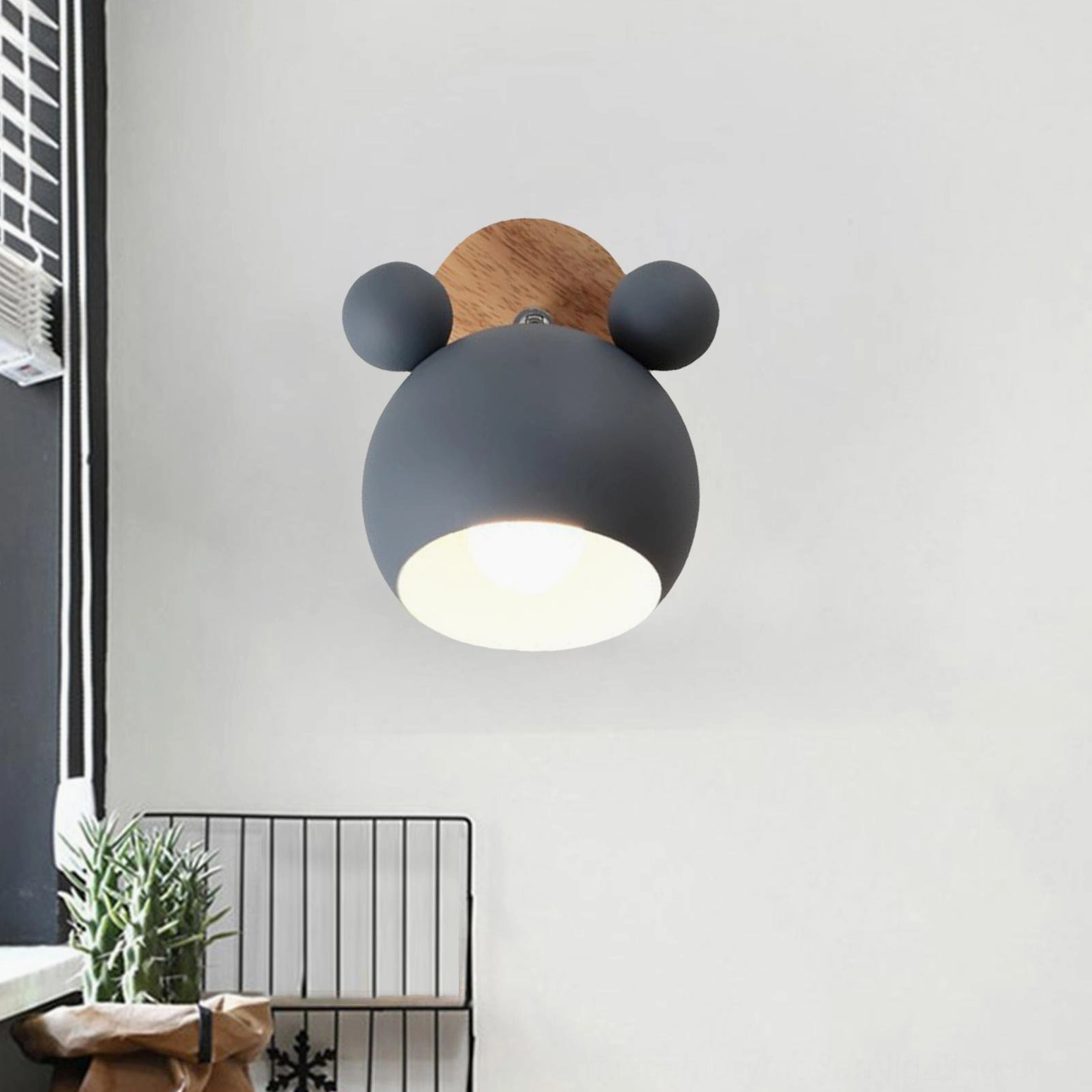 Multi-light setup with several mouse sconces creating layered ambient lighting display