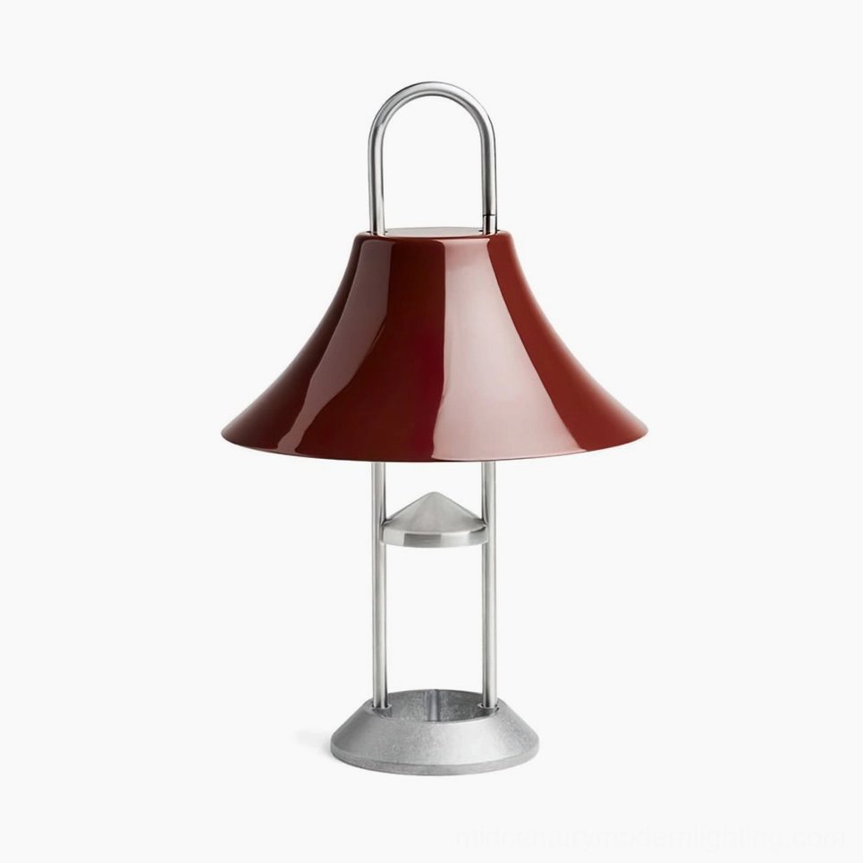 Red Mousqueton battery-powered portable table lamp with bold finish and modern industrial design aesthetic