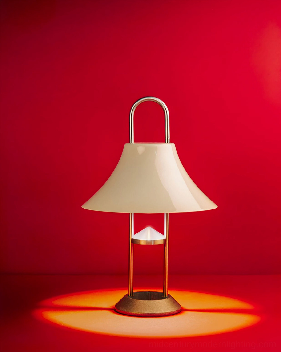 Red Mousqueton portable cordless lamp with vibrant finish displayed as contemporary furniture accent piece