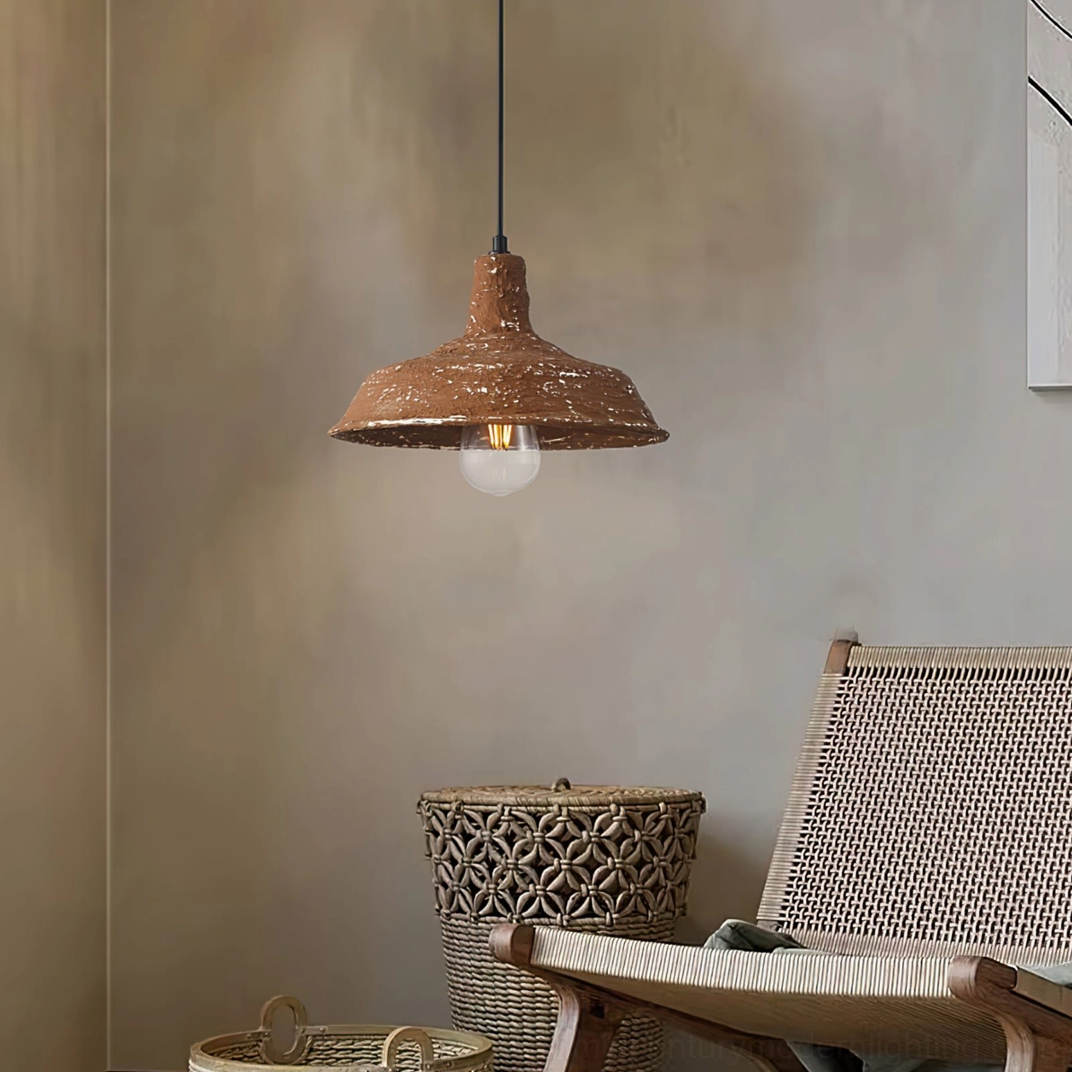 Mulino wabi-sabi pendant light in cozy living room with rattan chair and earthy decor