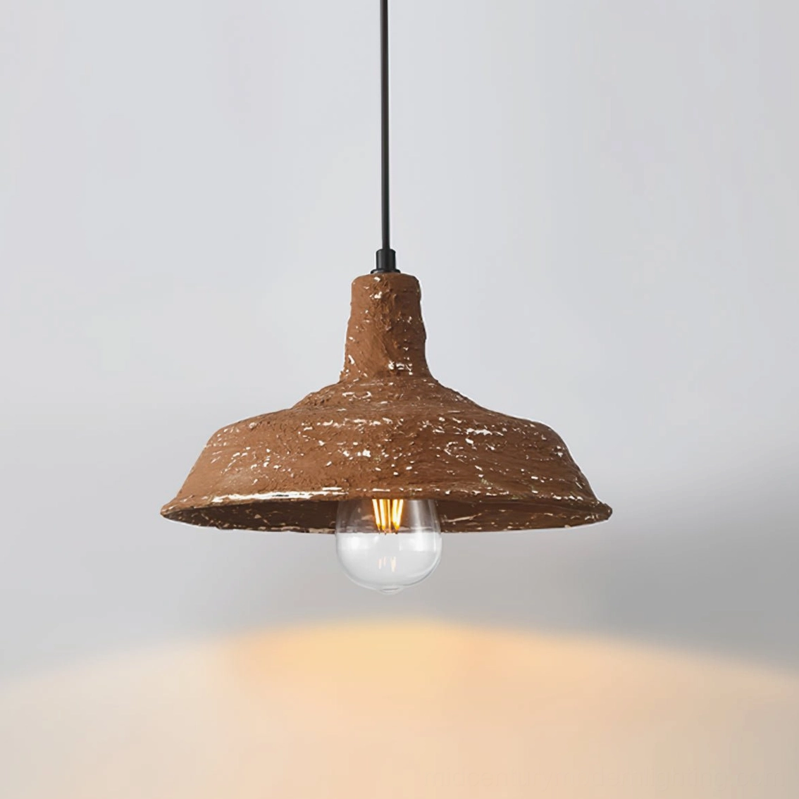Mulino rustic pendant with warm glowing ambient light effect showing illuminated base and shadow play