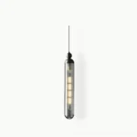 Mullan cylindrical pendant light with smoked gray ribbed glass shade and black metal hardware, studio product shot on white background