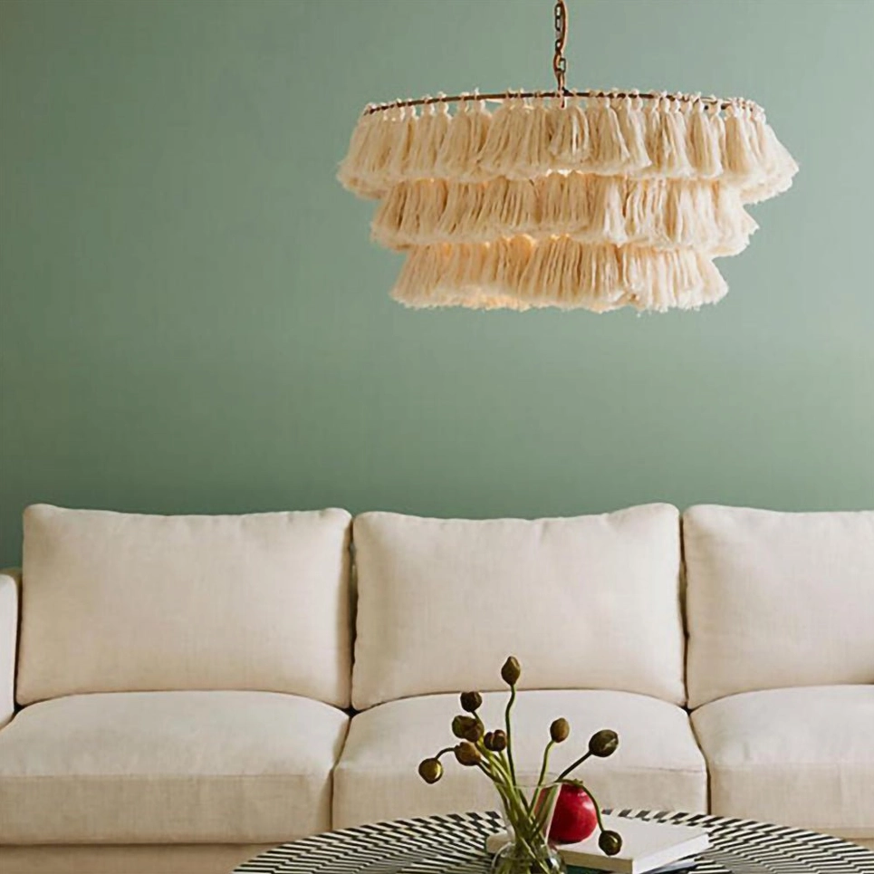 Multicolor tassel chandelier with vibrant eclectic fabric layers in contemporary bohemian interior