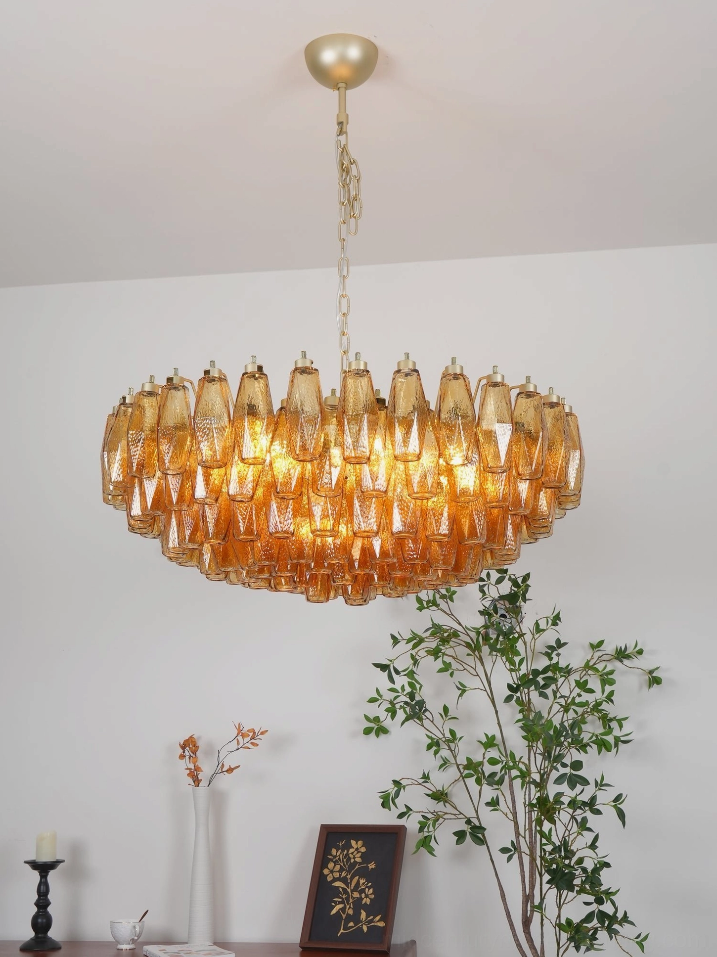 Hand-blown Murano glass chandelier with ridge texture on each amber glass element creating optical depth