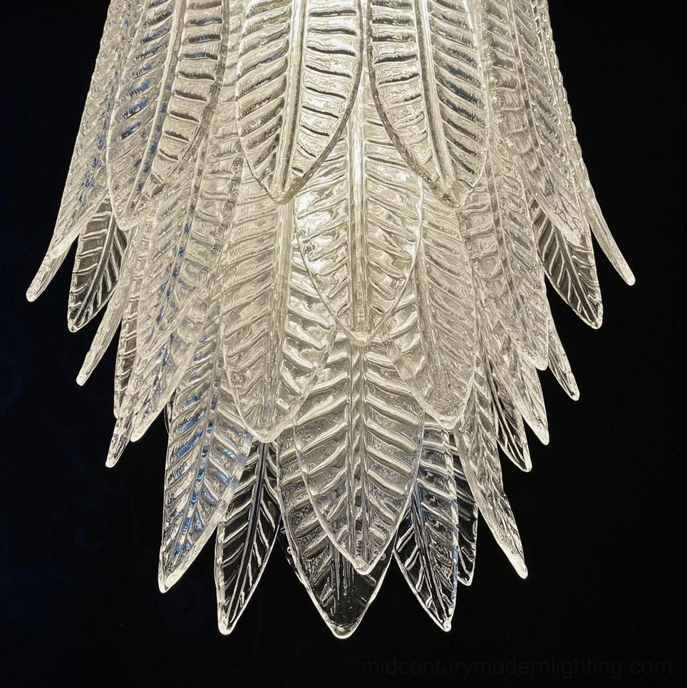 Bottom-up close-up view of Murano glass chandelier displaying dense textured layered leaf glass with high-gloss finish