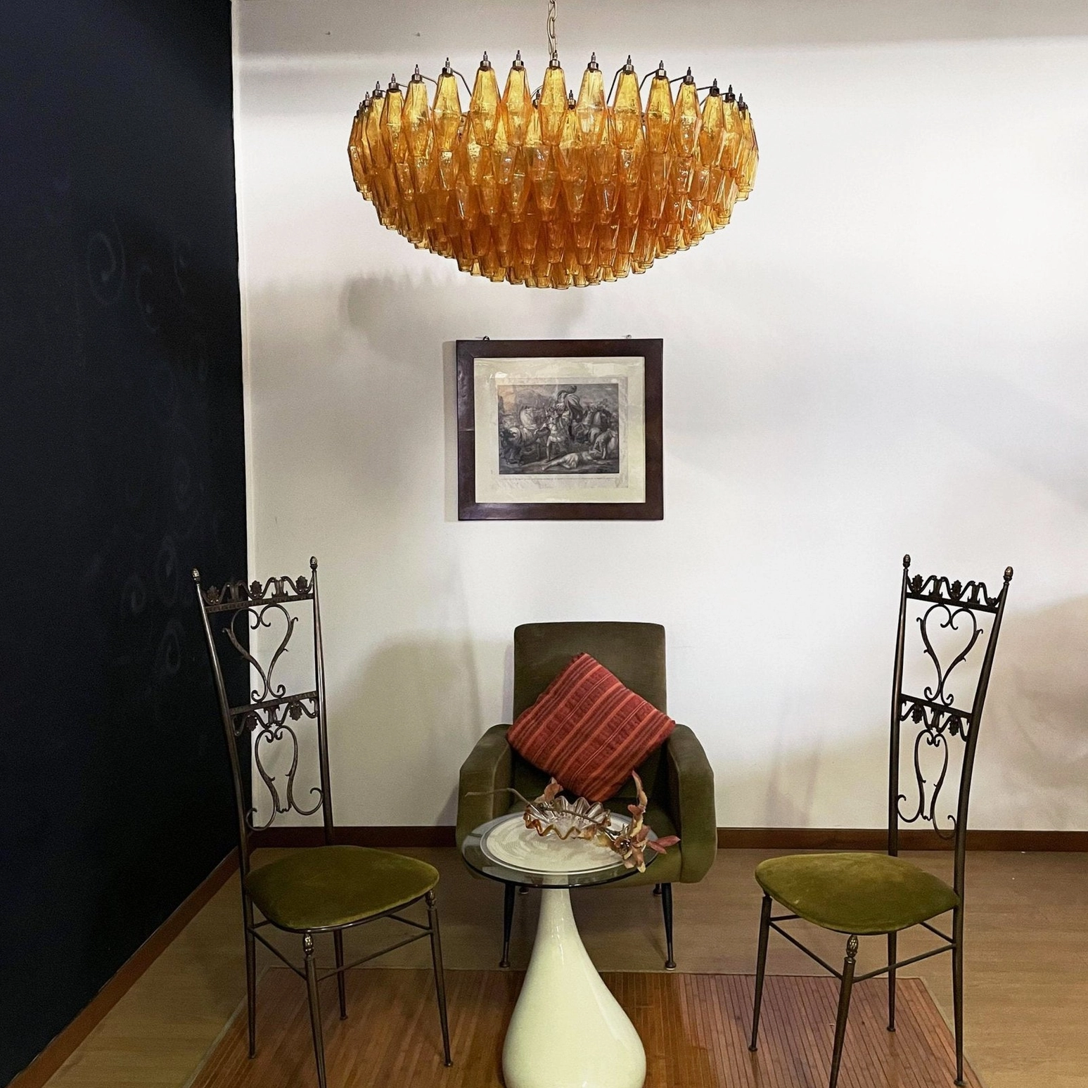 Geometric rhombus Murano chandelier installed over dining table in classic contemporary home setting