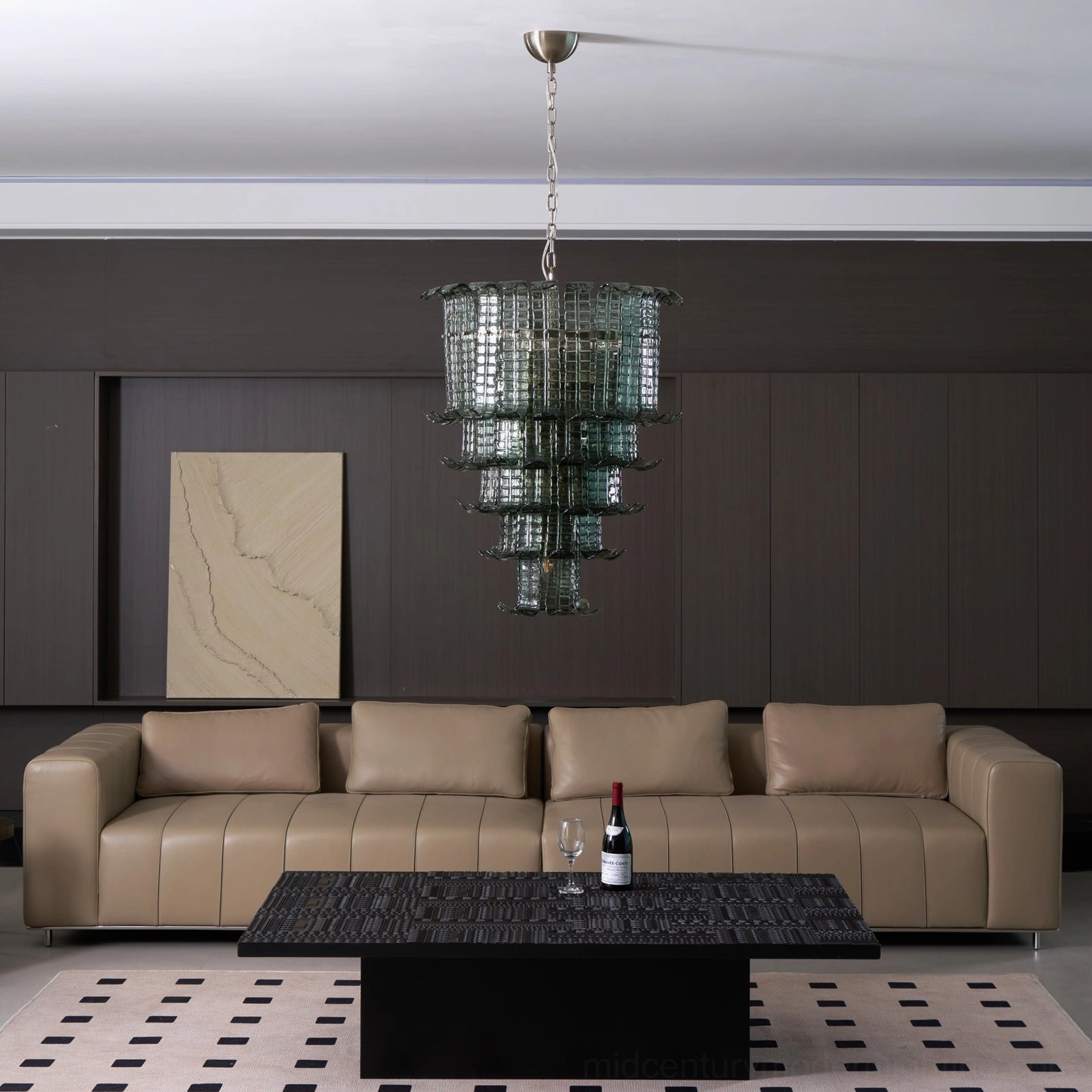 Murano tiered glass chandelier unlit in modern luxury living room with dark wood panels, showcasing sculptural glass architecture