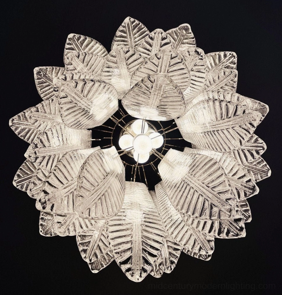 Top-down overhead view of Murano glass chandelier showing radial layered leaf glass pattern and central multi-bulb fixture architecture