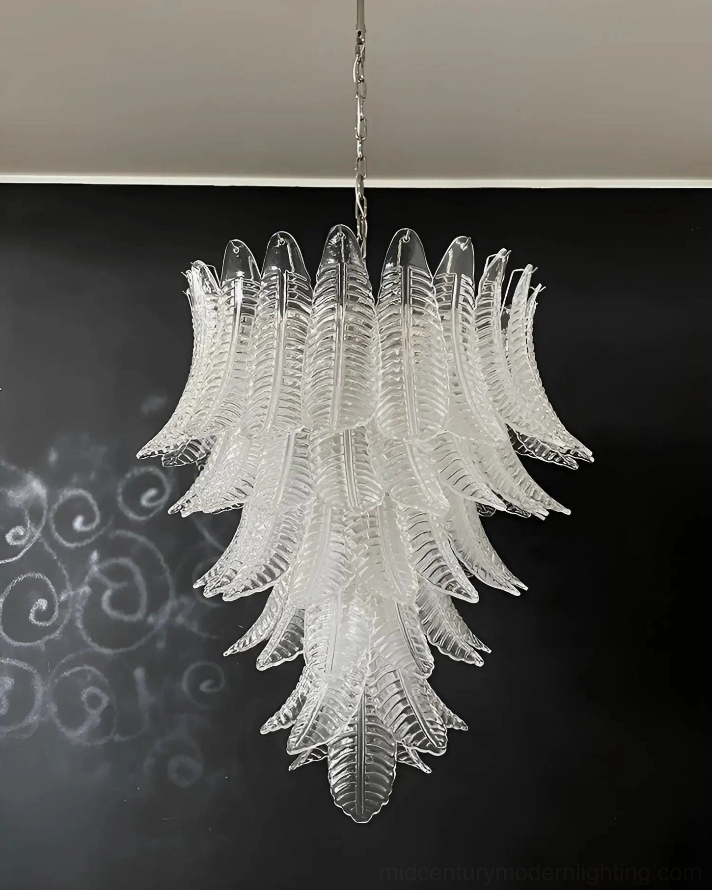 Tiered pink glass leaf structure Murano chandelier detailed side profile view