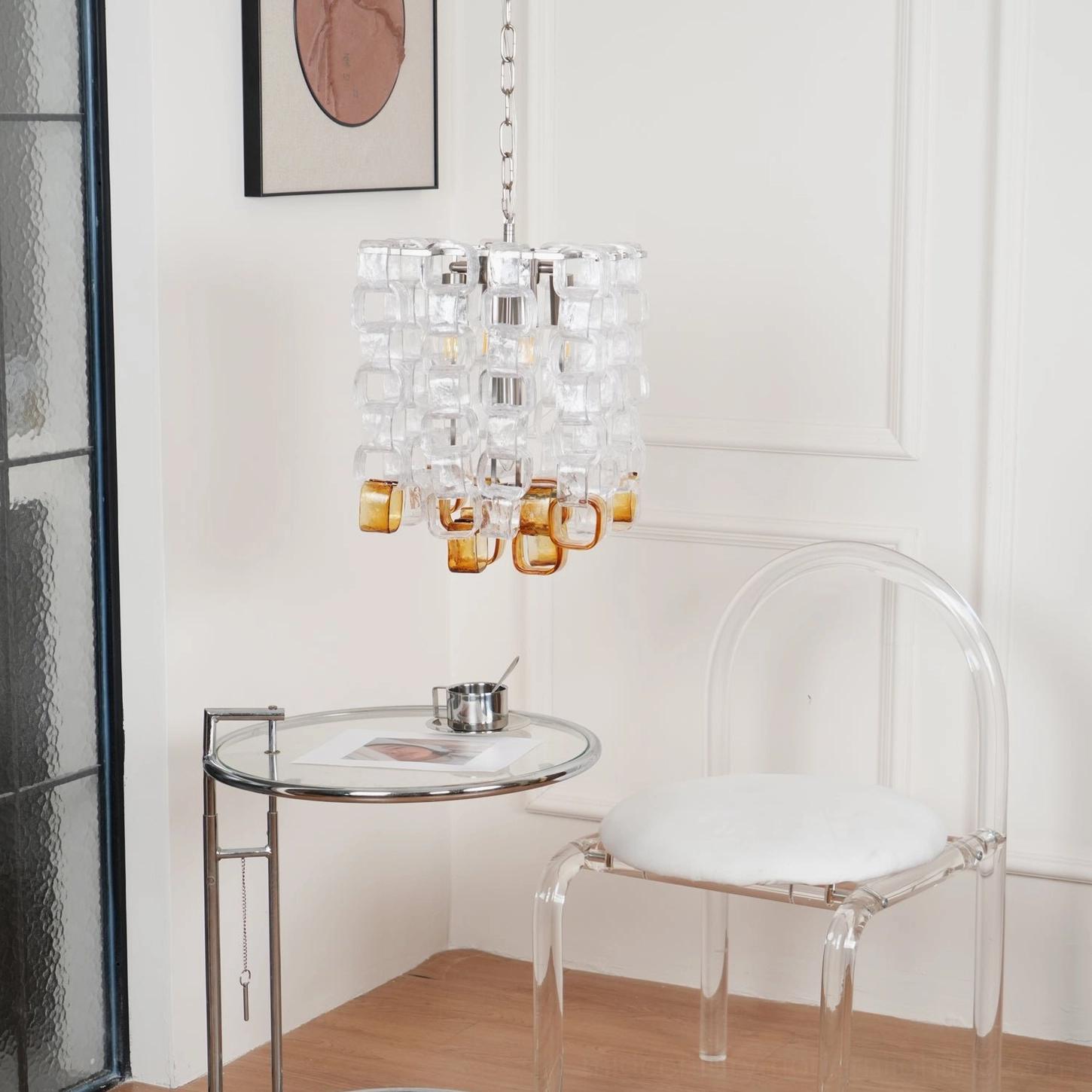 Elodie Murano pendant chandelier composition showing glass block arrangement and warm light transmission through amber sections