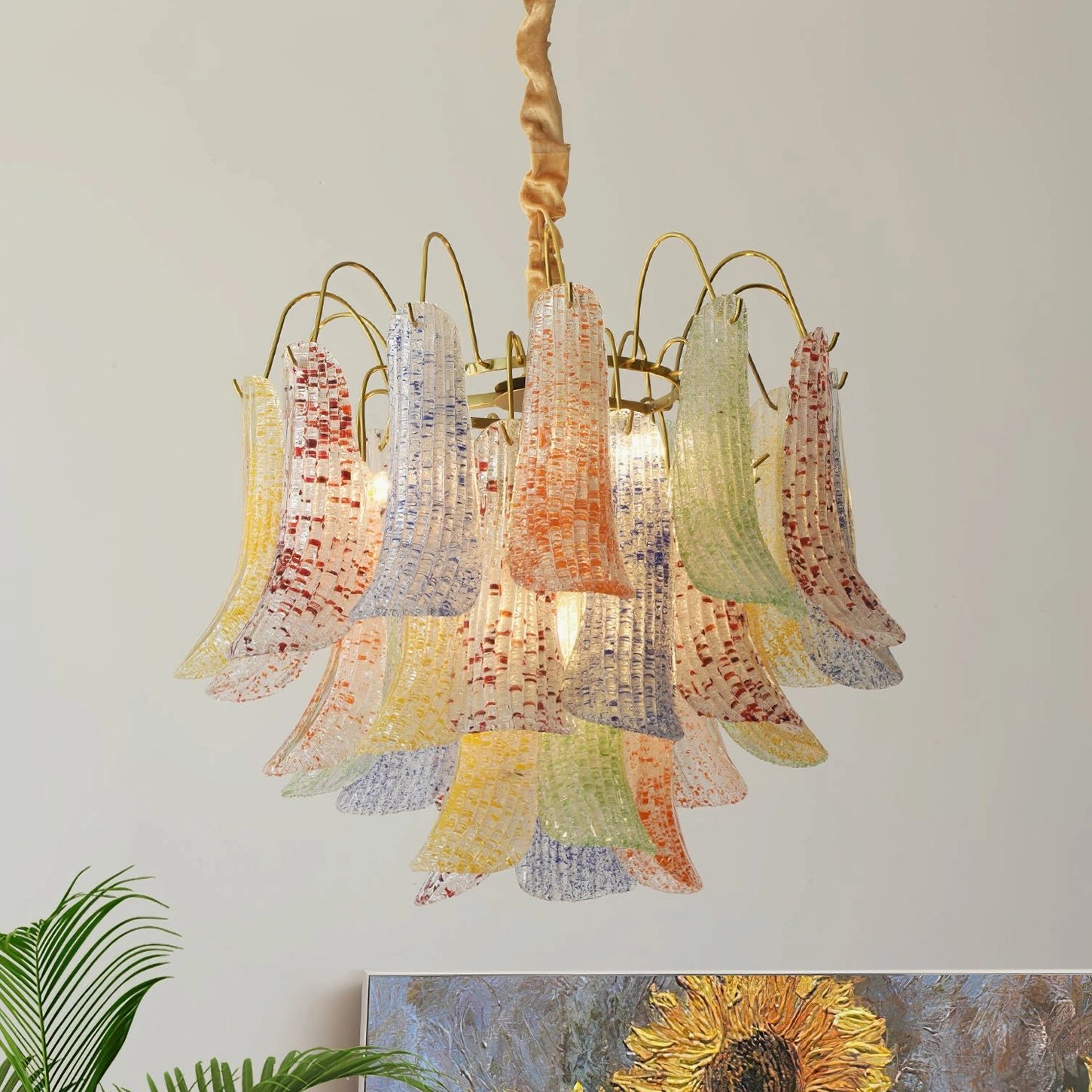 Green Murano glass chandelier with sage to forest hue petal leaves paired with botanical interior elements