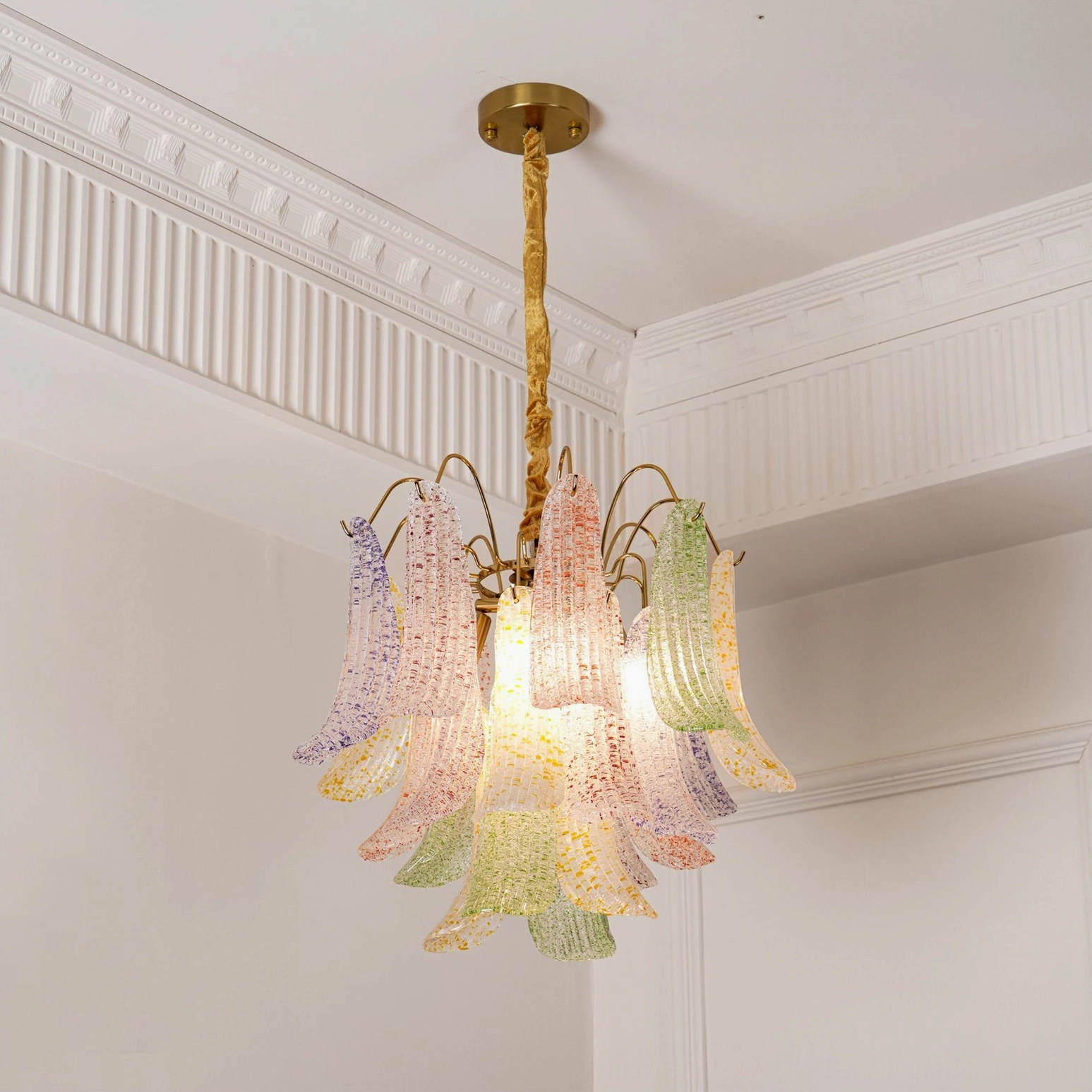 Murano glass chandelier with extended chain showing proper ceiling installation and hanging height