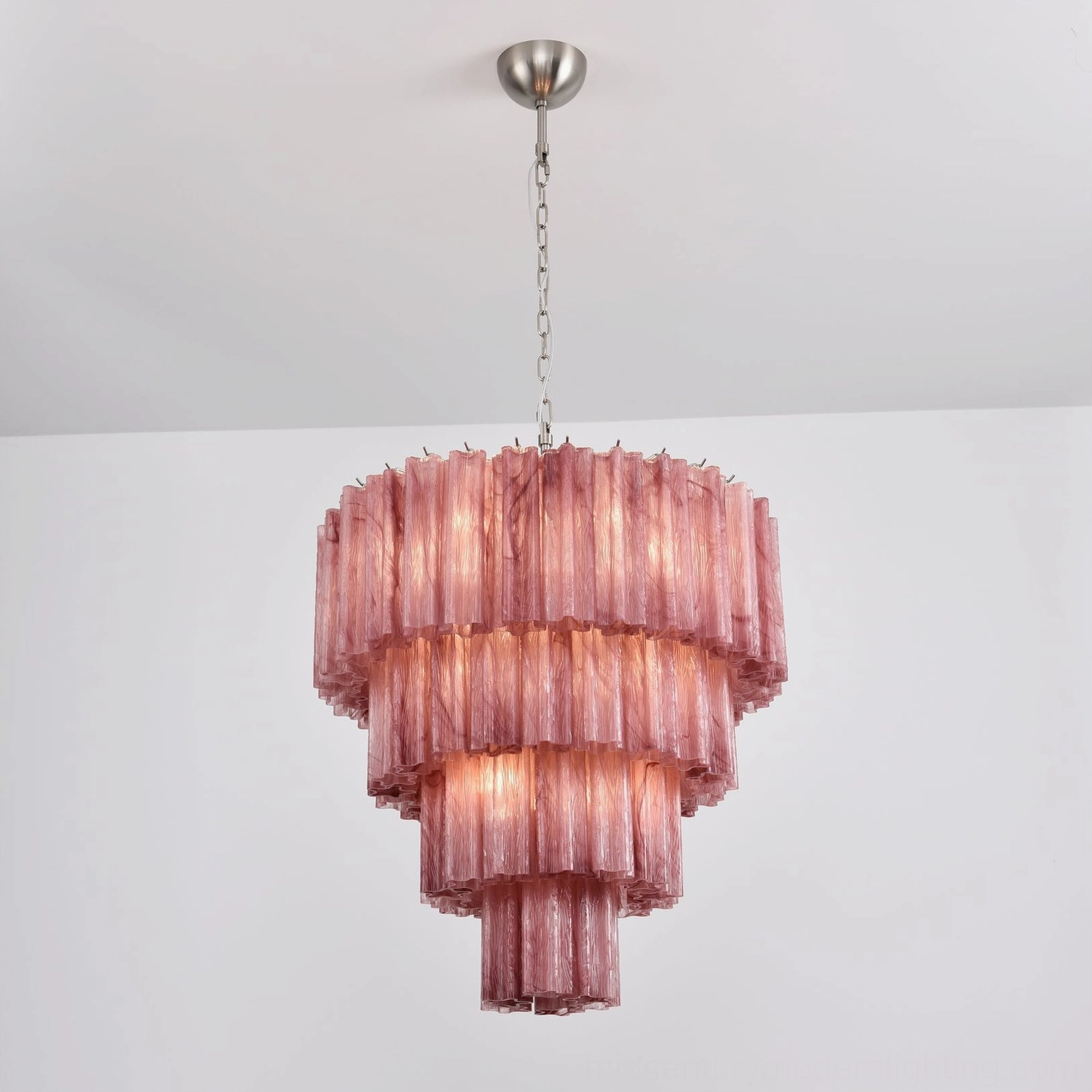 Handcrafted Murano glass chandelier brushed metal frame detail luxury craftsmanship