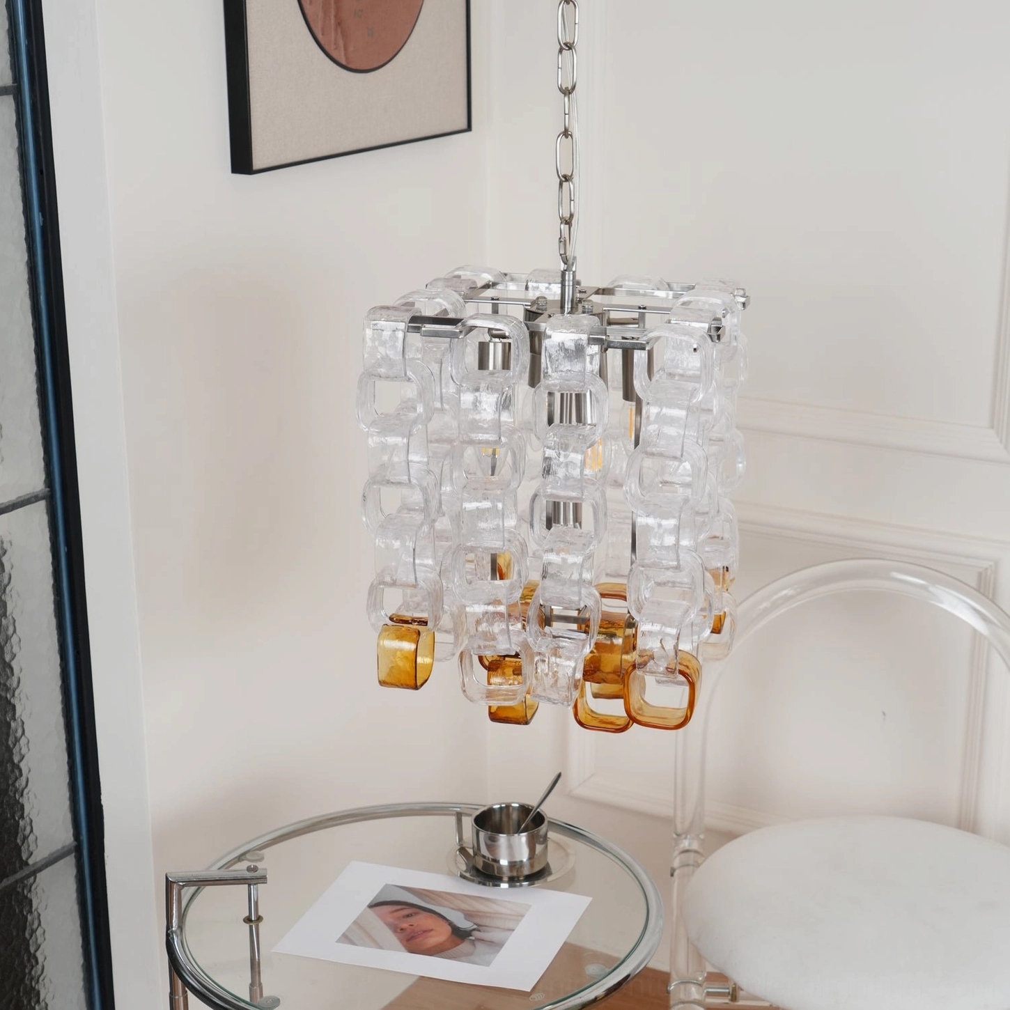 Elodie Murano chandelier in minimalist modern interior setting, showing scale and architectural impact in contemporary space