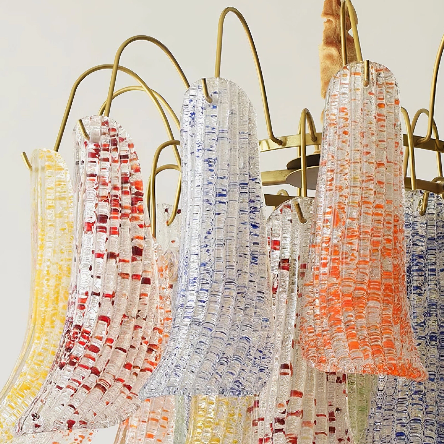 Venetian inspired Murano glass petal chandelier showcasing mid-century modern design heritage and craftsmanship