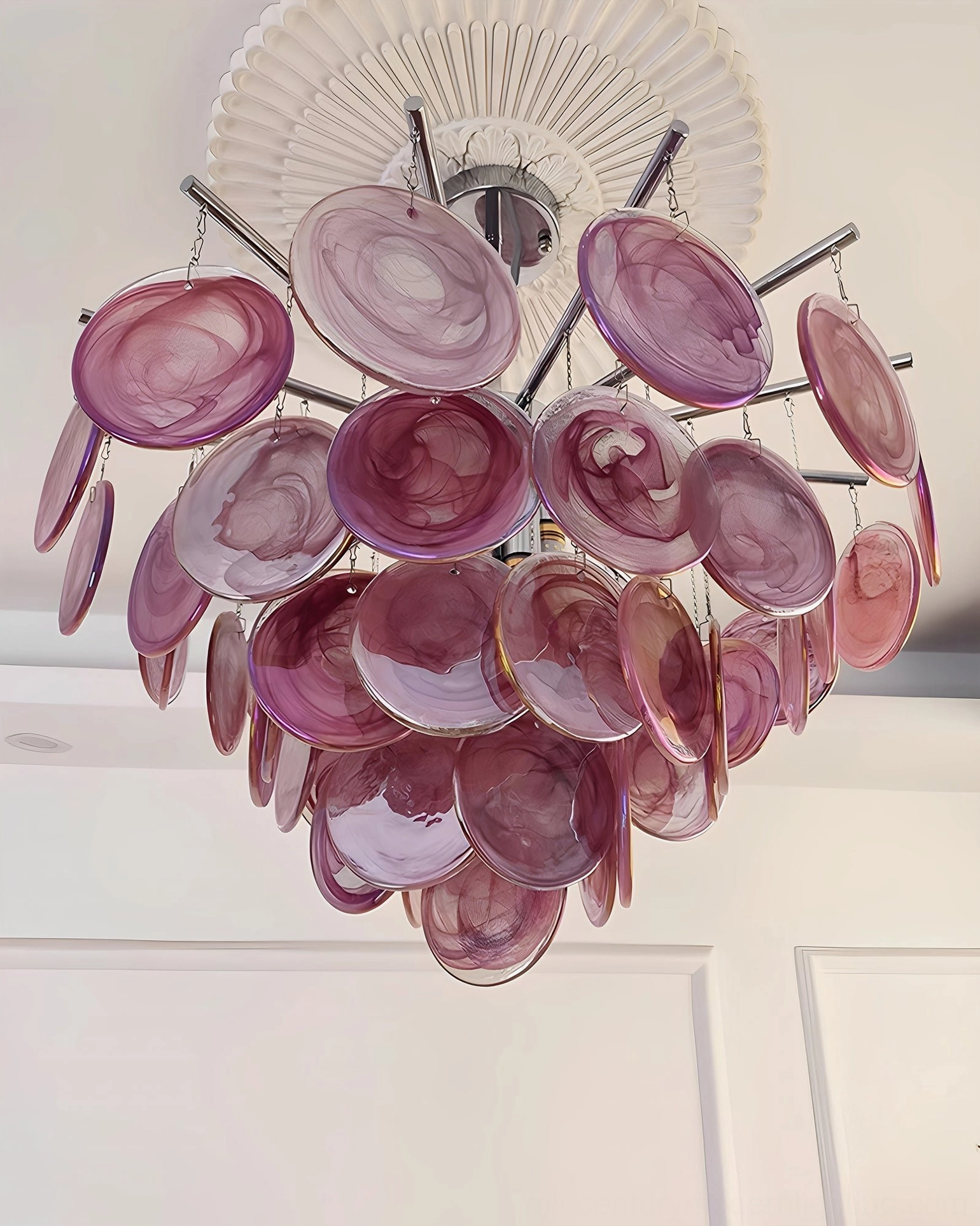 Murano glass disc details showing hand-formed marble-swirl texture and individual color variations