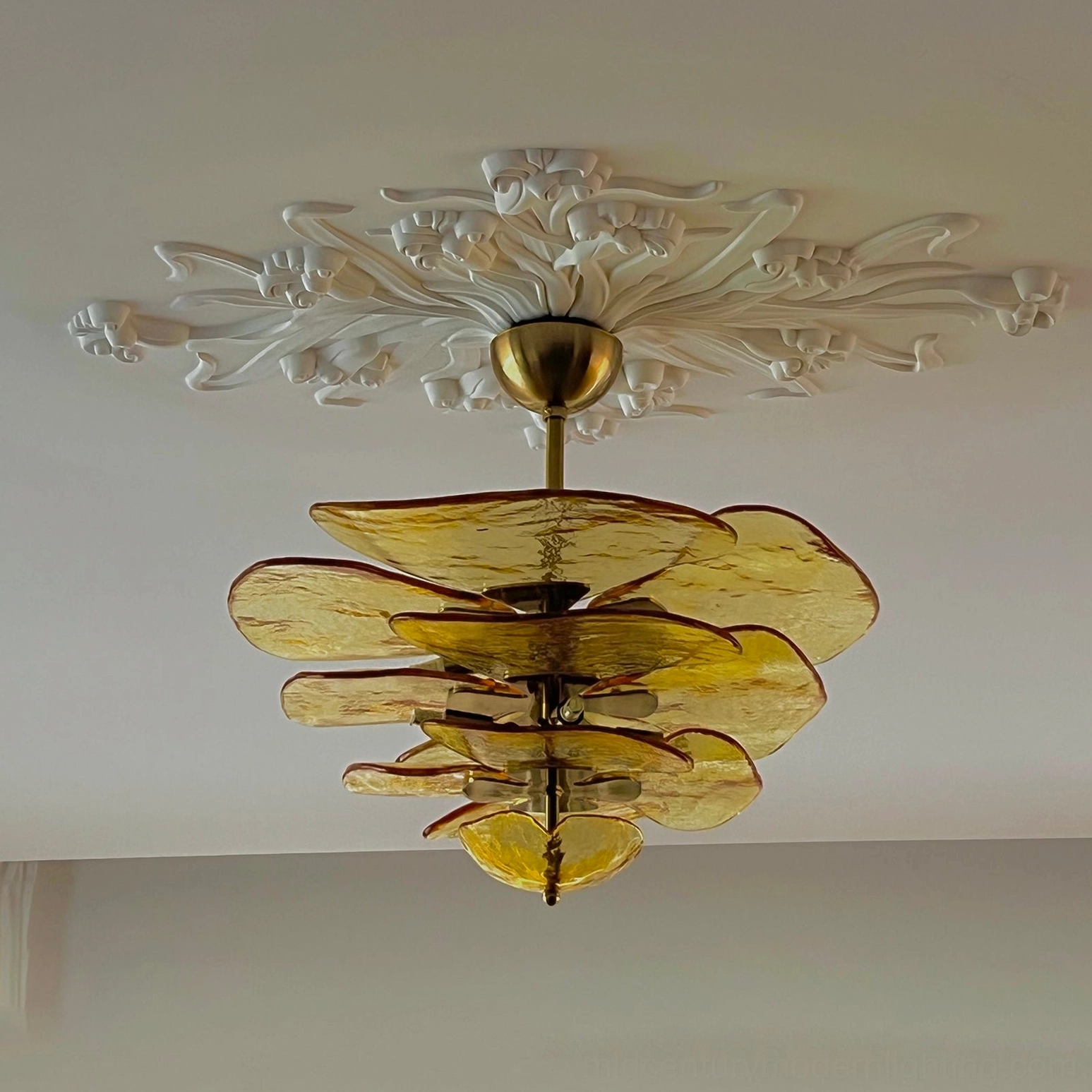 Murano lotus leaf chandelier interior installation showing scale and lighting effect in room