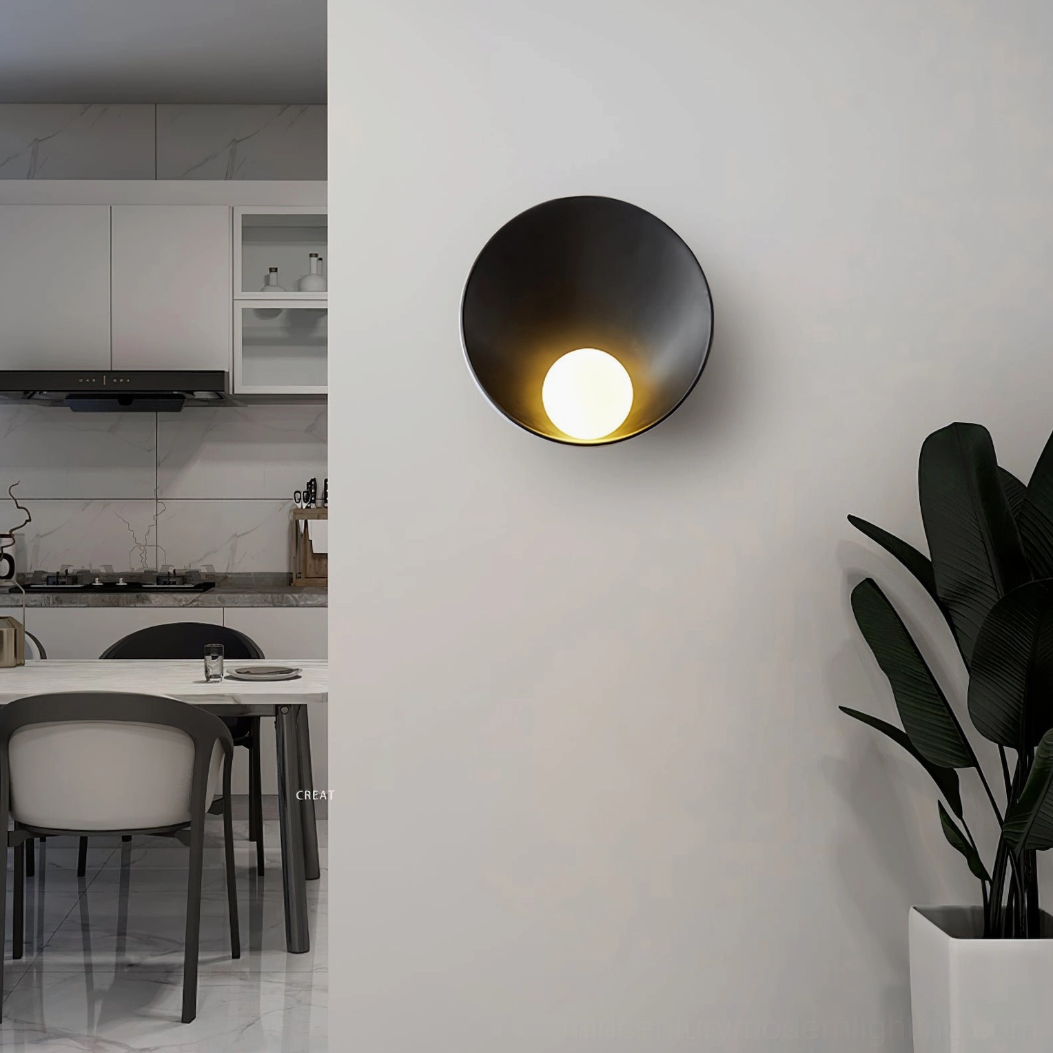 Musa black wall lamp mounted in modern kitchen dining area with bright warm LED illumination