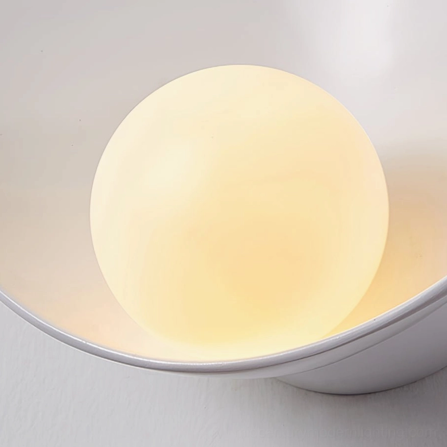 Musa contemporary wall light mounted in styled interior showing mid-century modern design aesthetic