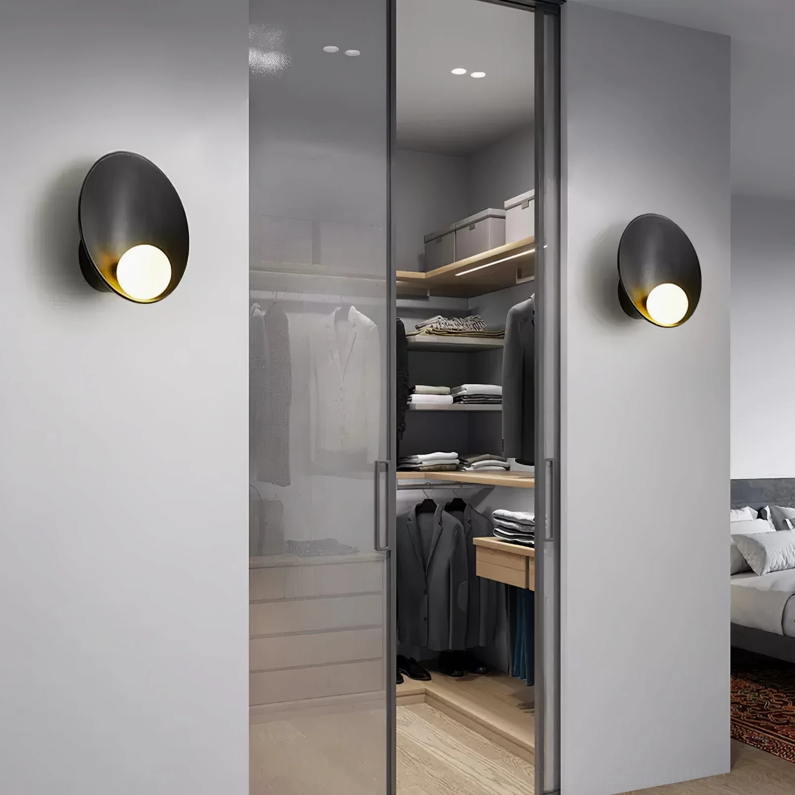 Musa wall lamp close-up showing minimalist metal construction and integrated light diffusion system