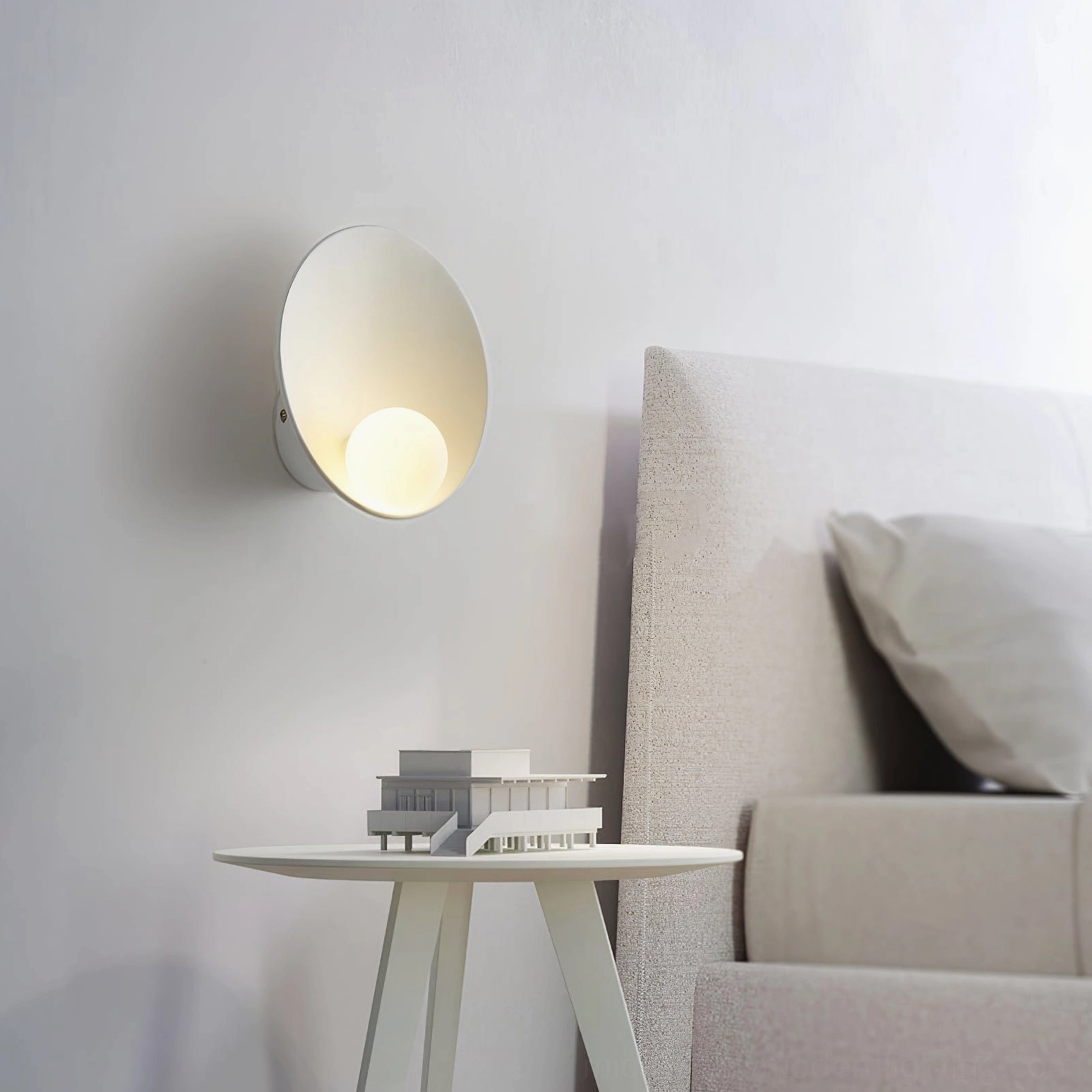 Musa organic wall sconce design detail showing sculptural frosted glass diffuser and metal shade