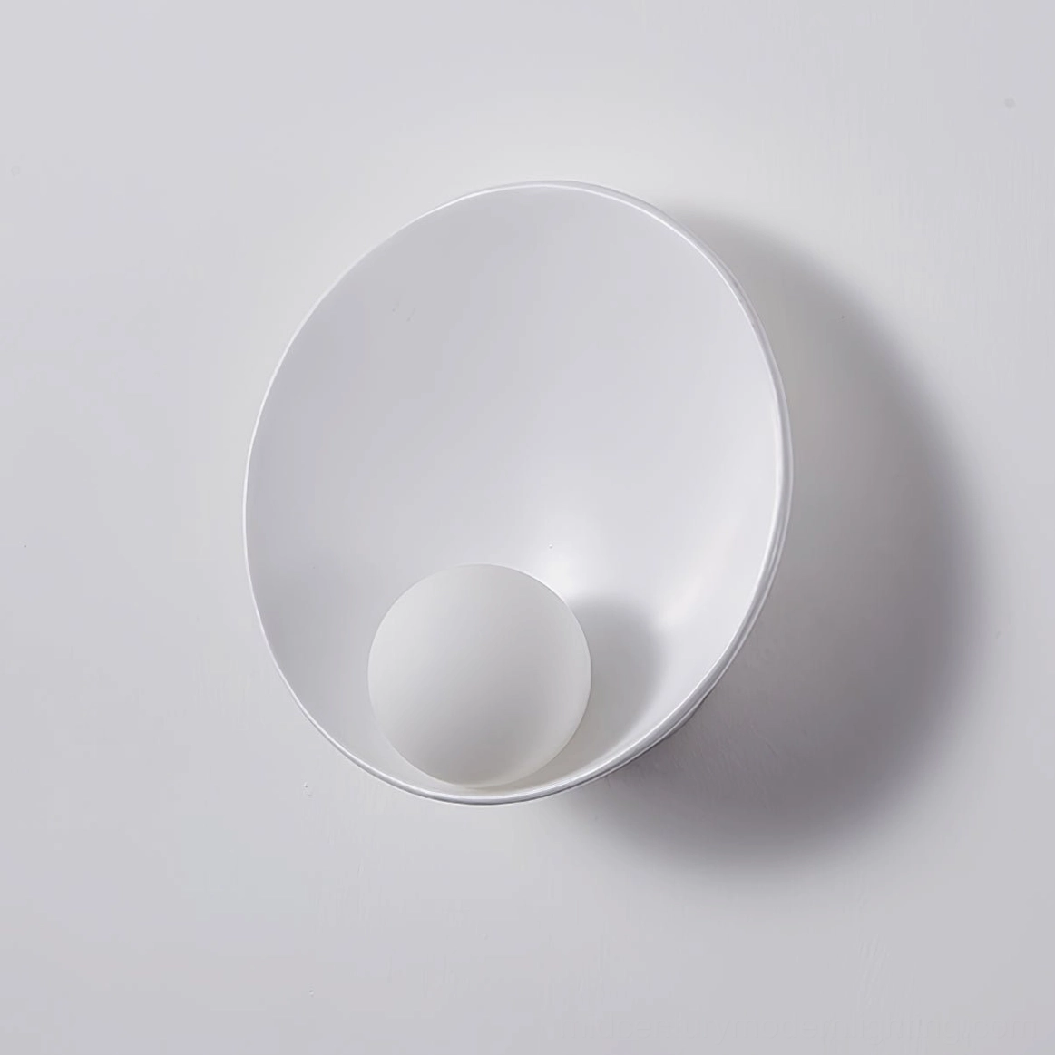 Musa wall sconce detail shot emphasizing sculptural form and premium resin-glass material craftsmanship