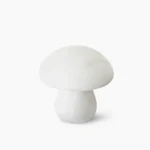 Mushroom alabaster table lamp with organic rounded silhouette, matte white finish, front view on clean background