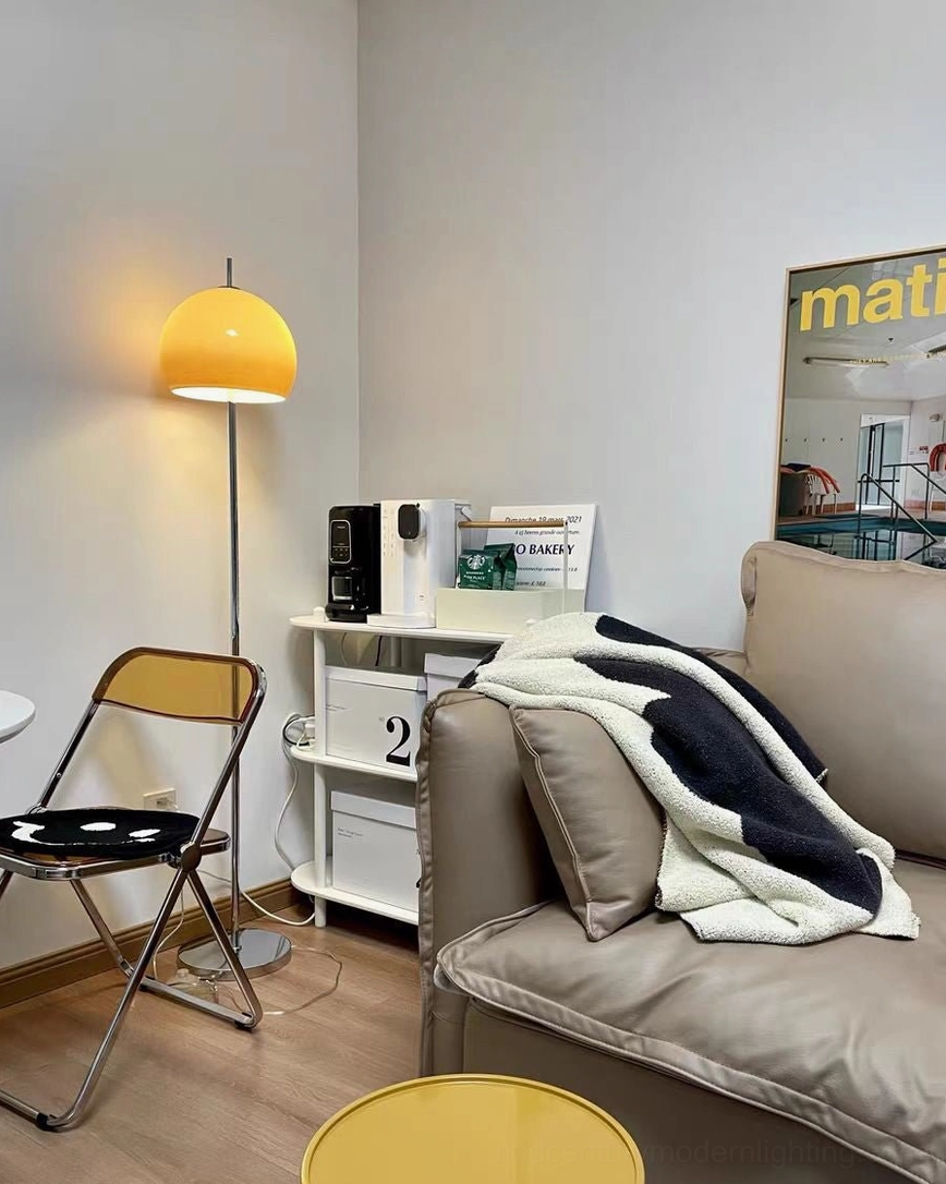 Vintage mushroom floor lamp in modern living room with neutral furniture and warm lighting tone