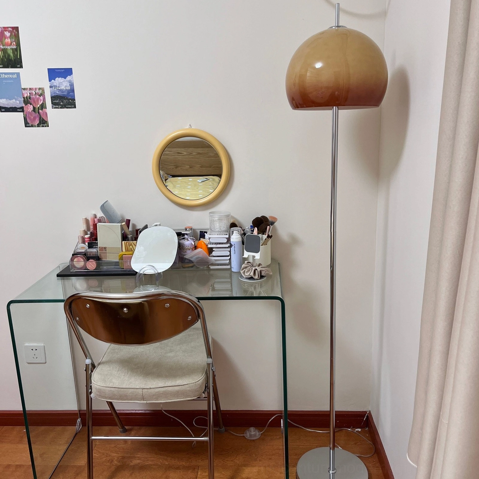 Two-tone mushroom floor lamp in makeup vanity area with gradient brown shade and minimalist design