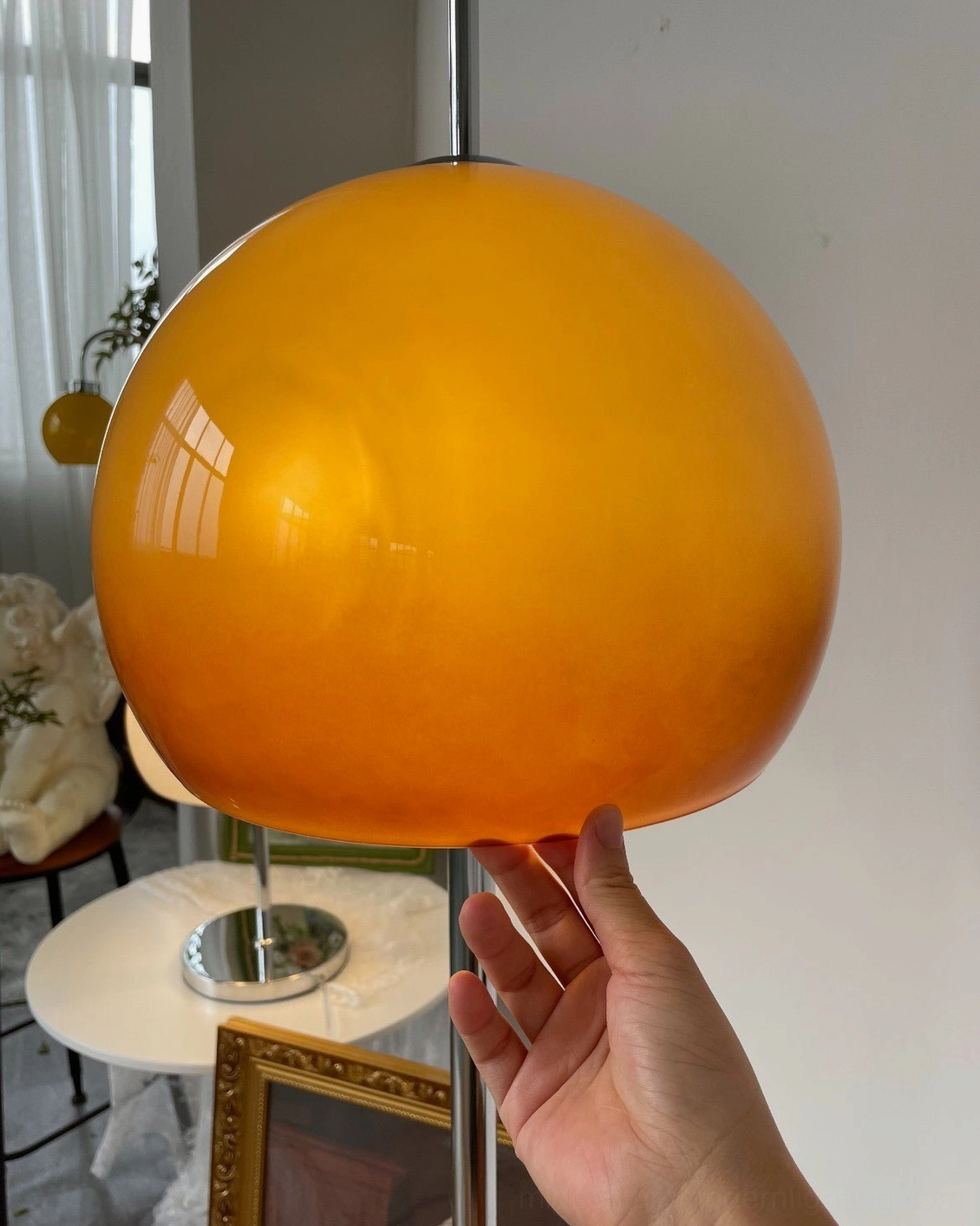 Mushroom floor lamp demonstrating scale and presence in residential space