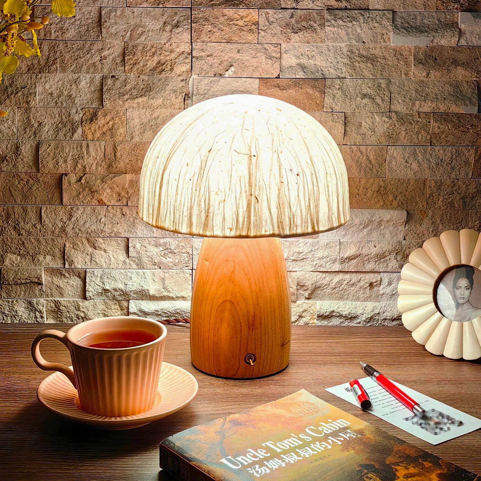Mushroom table lamp three-quarter view showing textured paper shade construction detail