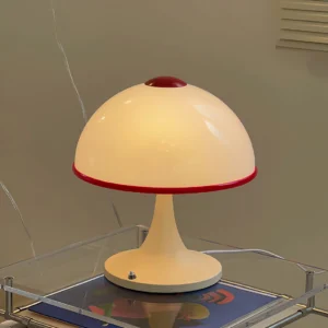 Vintage mushroom table lamp glowing warmly on side table, cozy home interior lighting