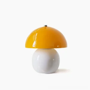 Mushroom ceramic table lamp with white glossy shade and orange ceramic base, frontal studio view, mid-century modern design
