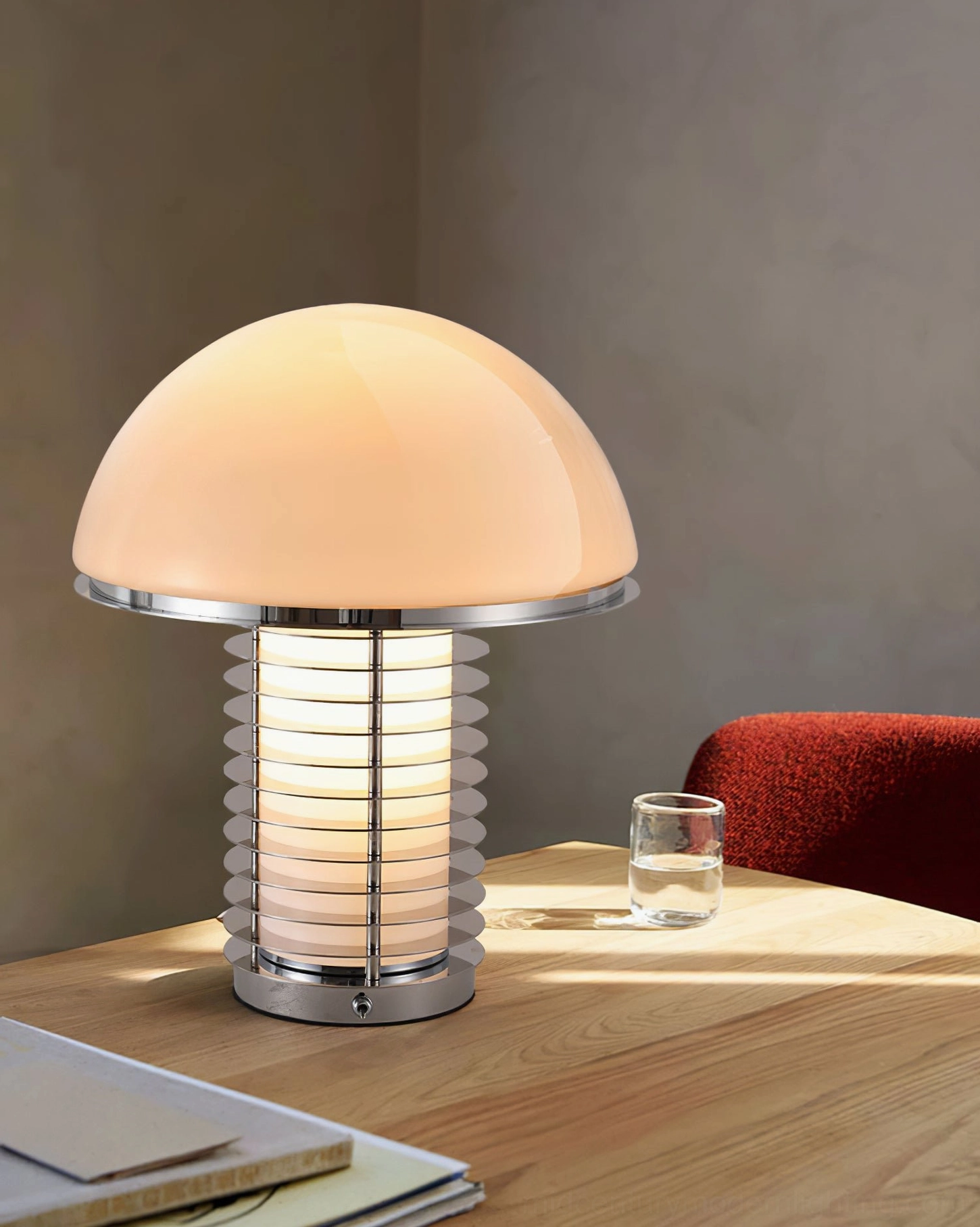 Mushroom table lamp creating warm glowing light on wooden dining table with modern home decor