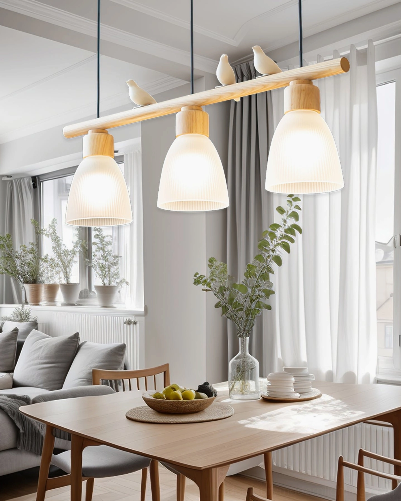 Muto Bird Chandelier in modern dining room - 3-head pendant light over dining space with Nordic interior