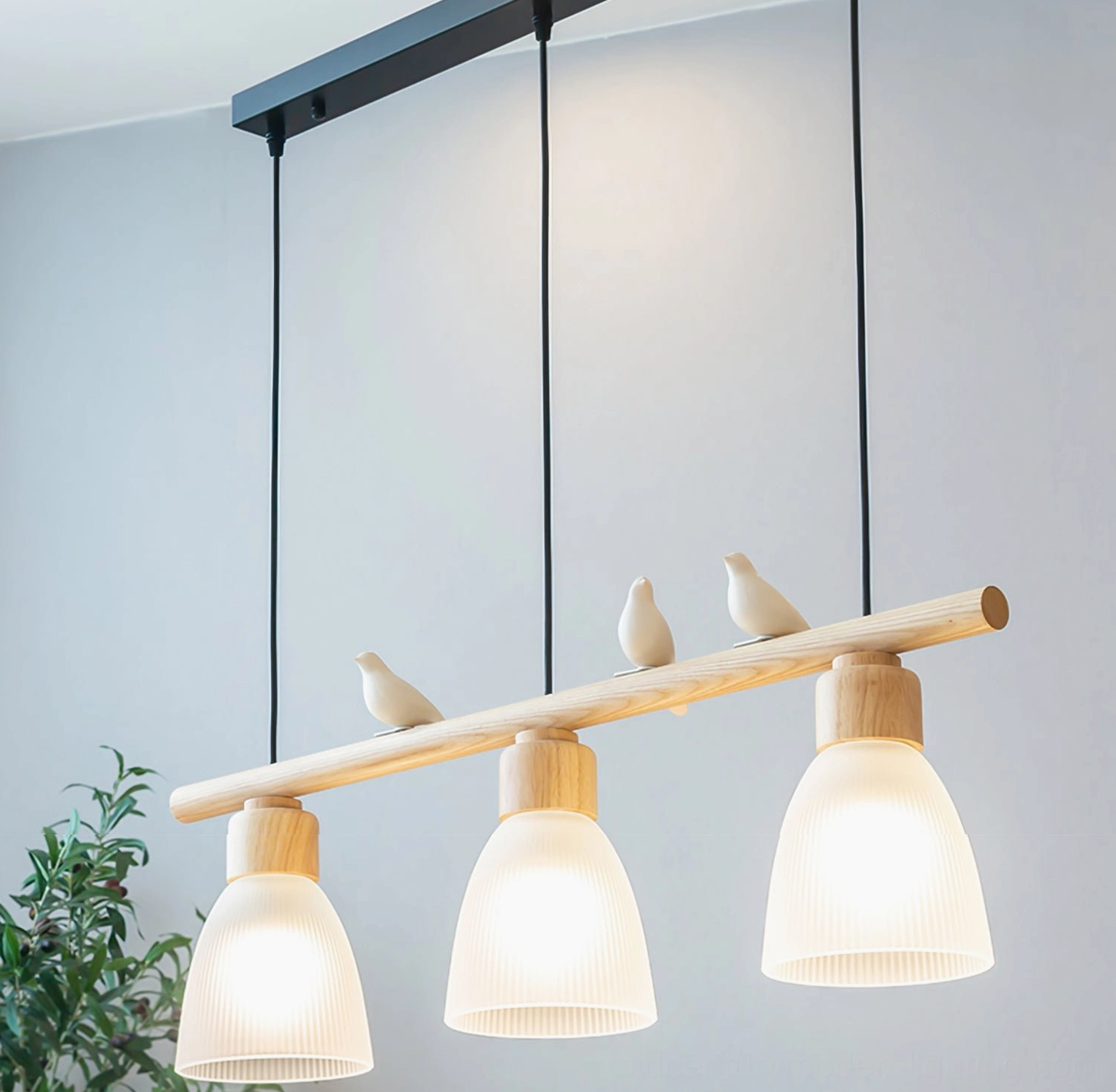 Muto Bird Chandelier warm illuminated - pendant light with ribbed frosted glass shades and botanical styling