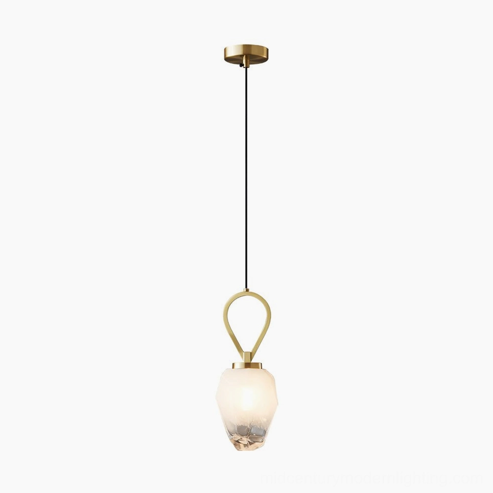 Myla faceted glass pendant lamp showing interior light diffusion and geometric shade refraction, side profile view