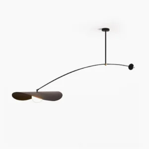 Myrna arc ceiling pendant light with articulating arm and adjustable counterweight, displayed in studio setting with matte black metal frame